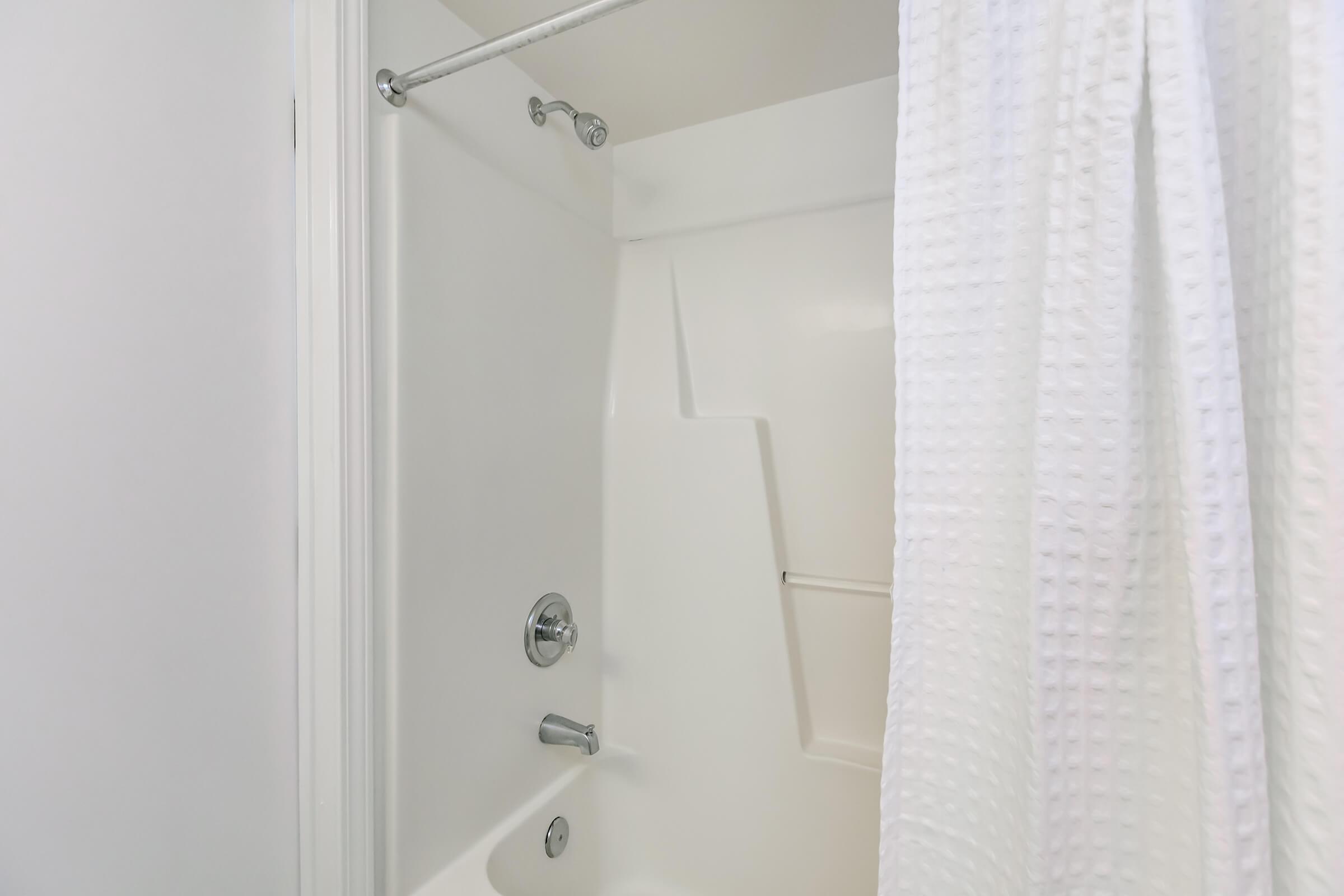Contemporary bathrooms at Windsor Place in Jacksonville, North Carolina.