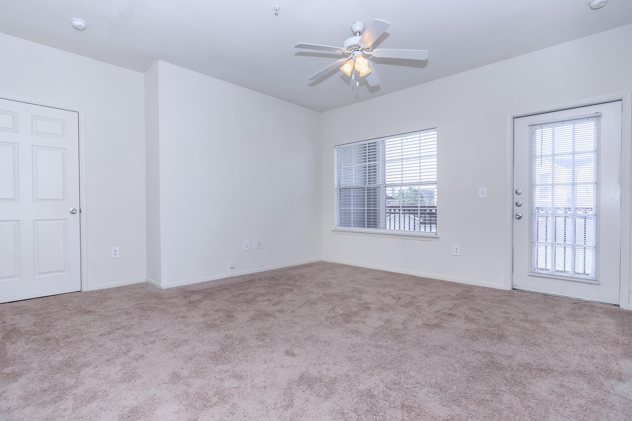 a living room next to a window