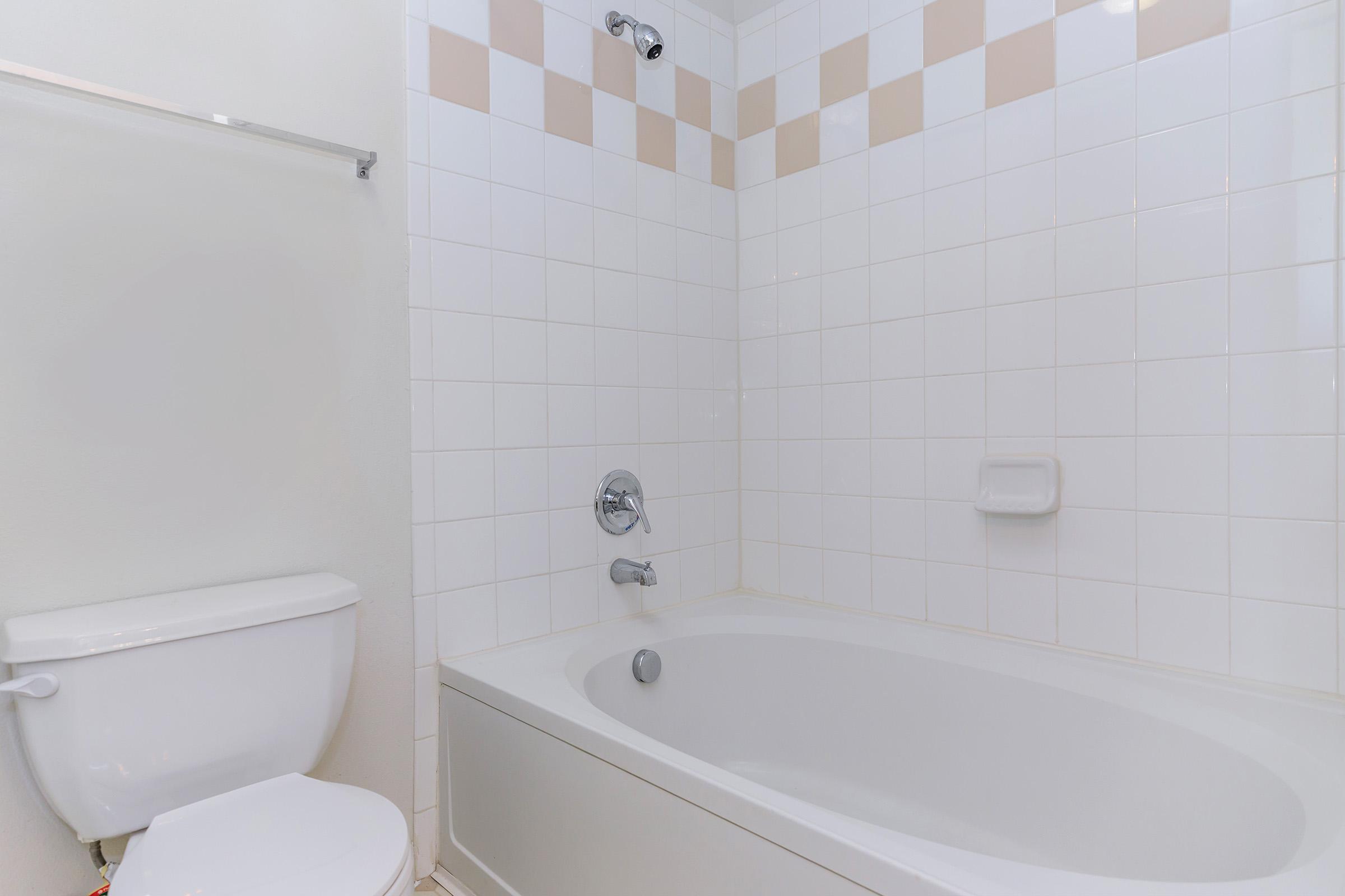 a close up of a sink and a bath tub