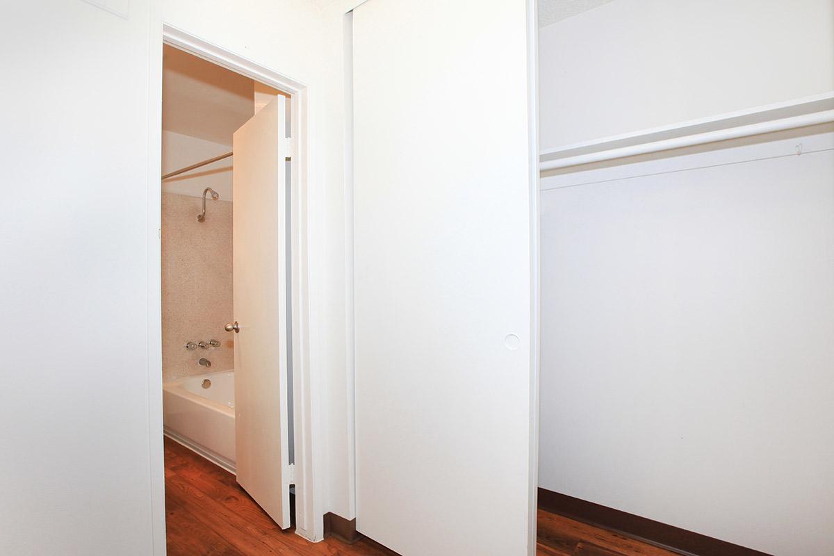 a white refrigerator freezer sitting inside of a building