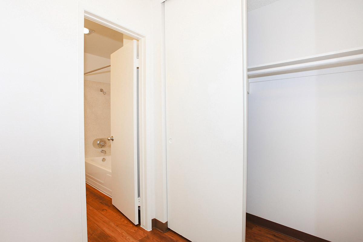 a white refrigerator freezer sitting inside of a building