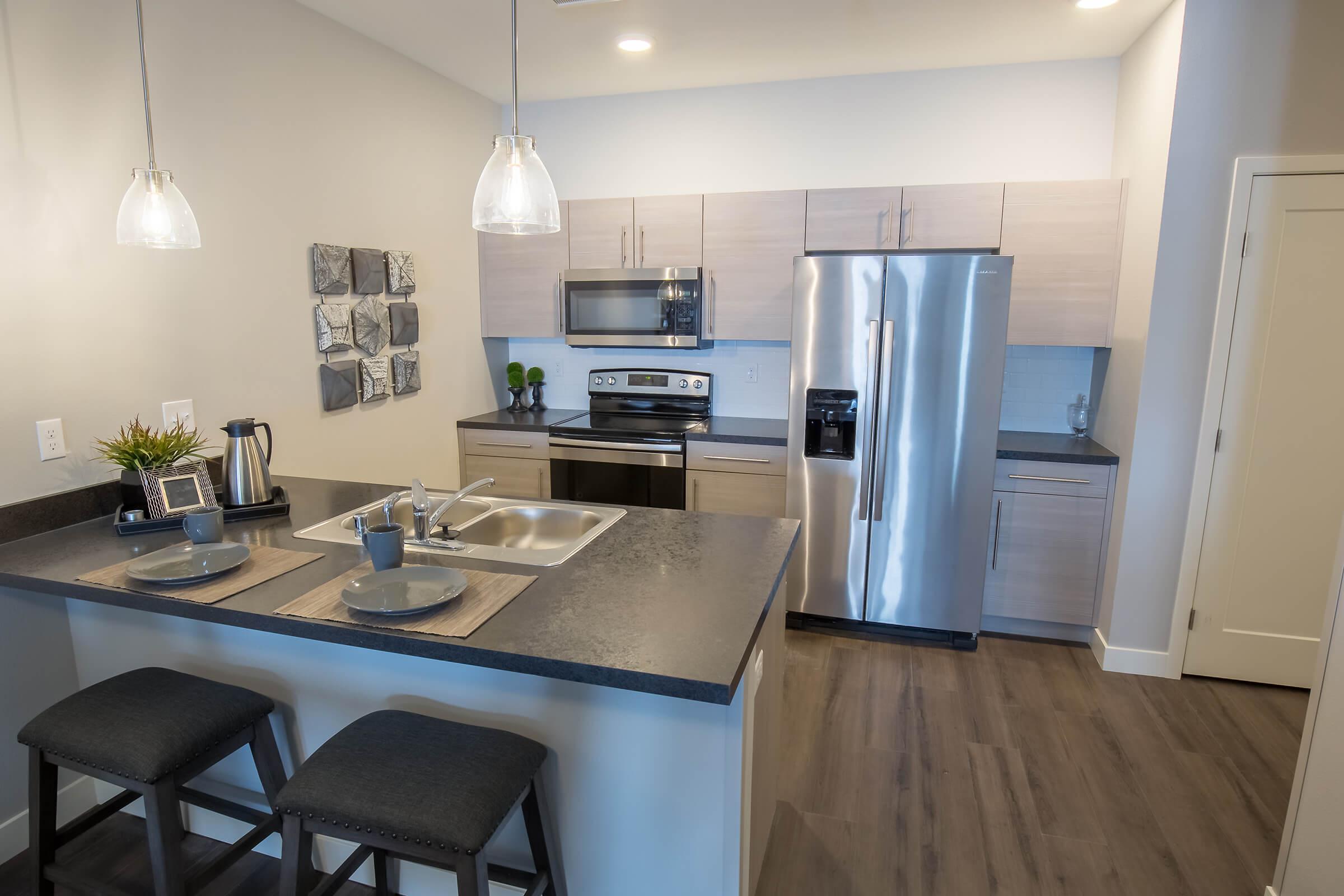 a kitchen with a dining table