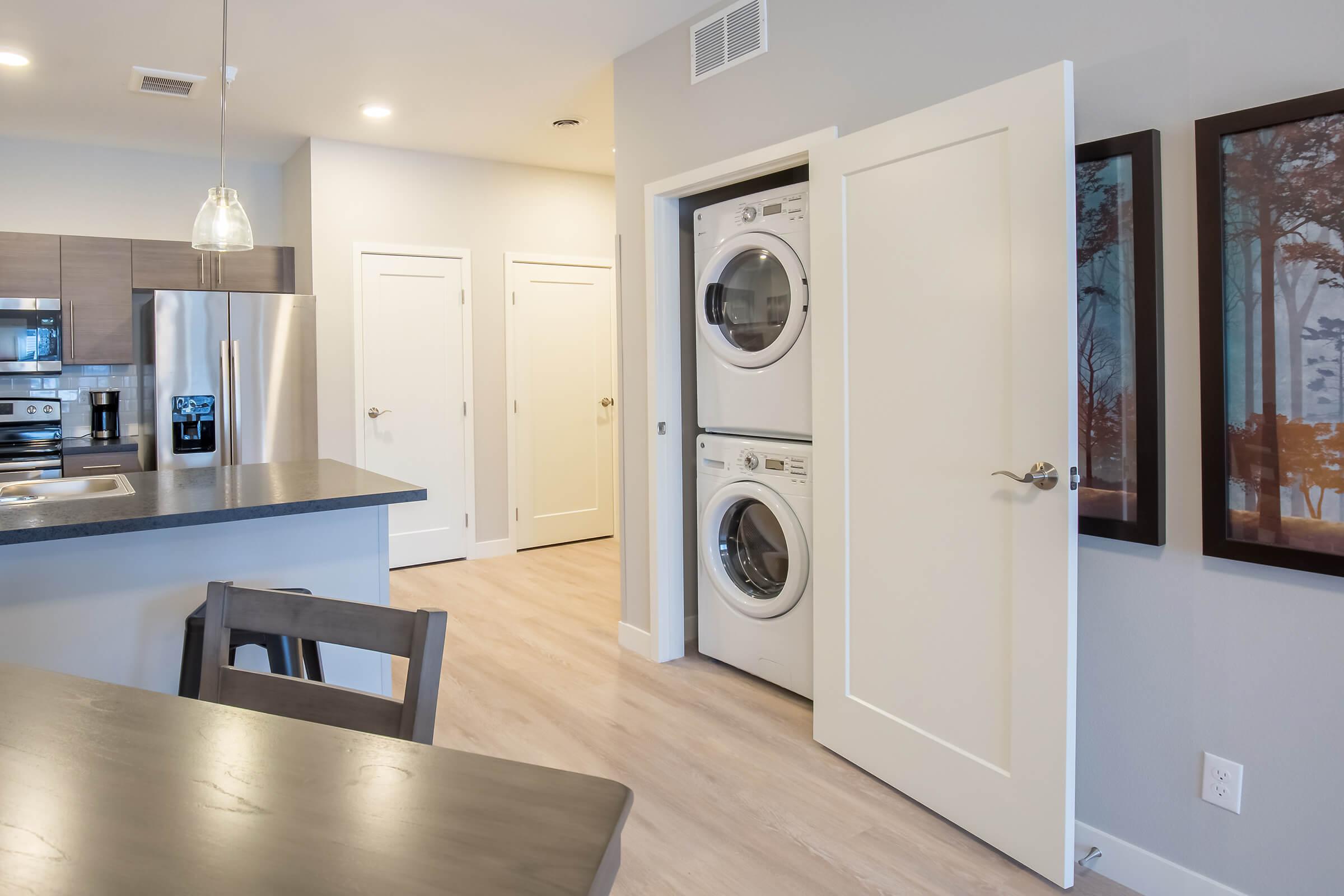 a stainless steel refrigerator in a kitchen