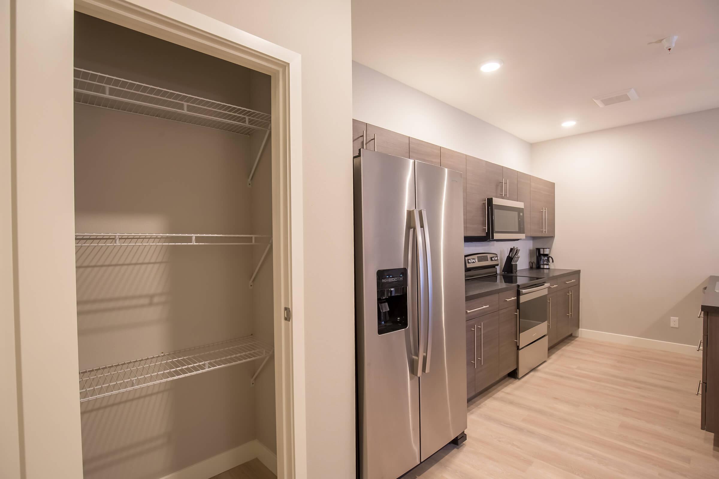 a stainless steel refrigerator in a kitchen