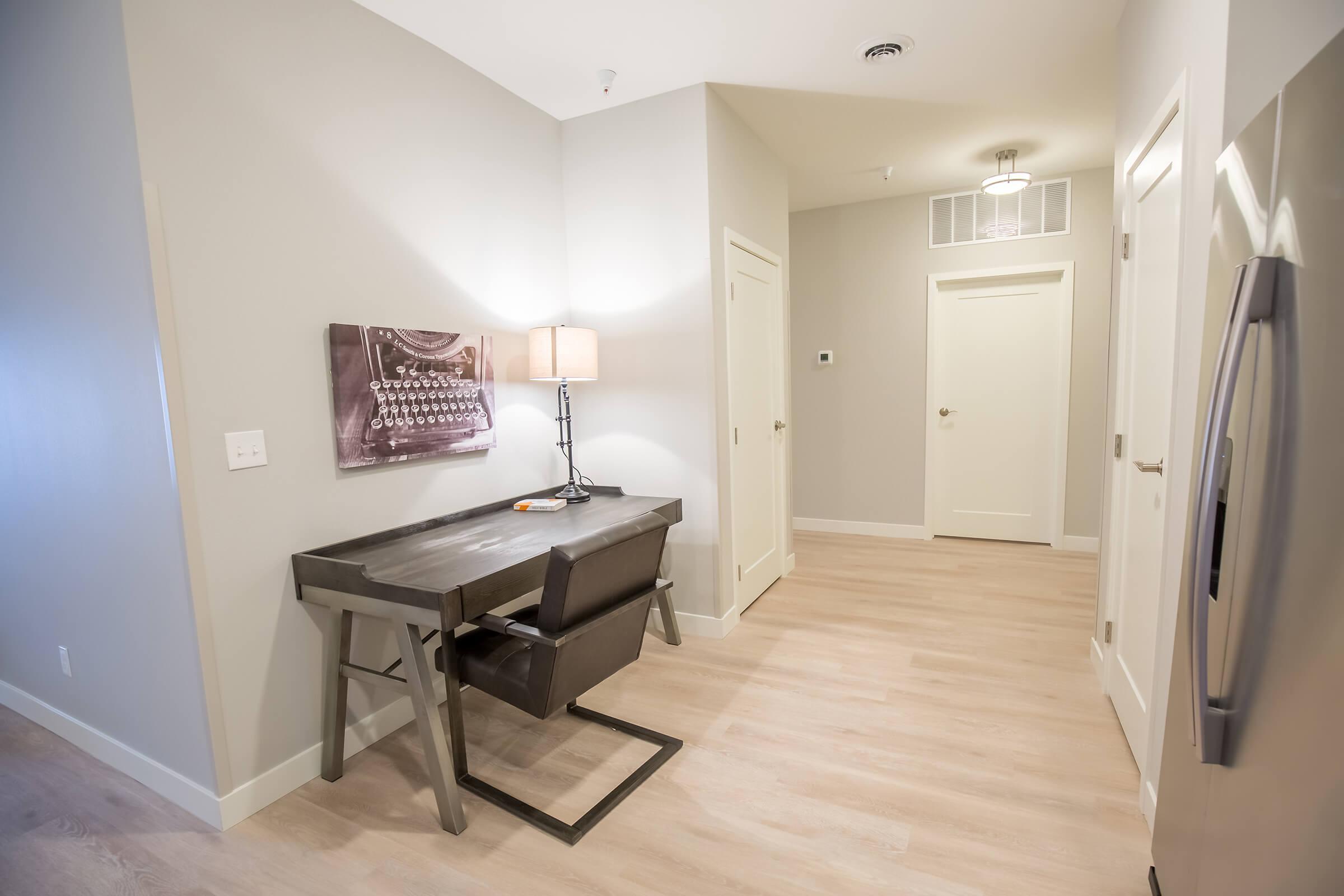 a kitchen with a wood floor