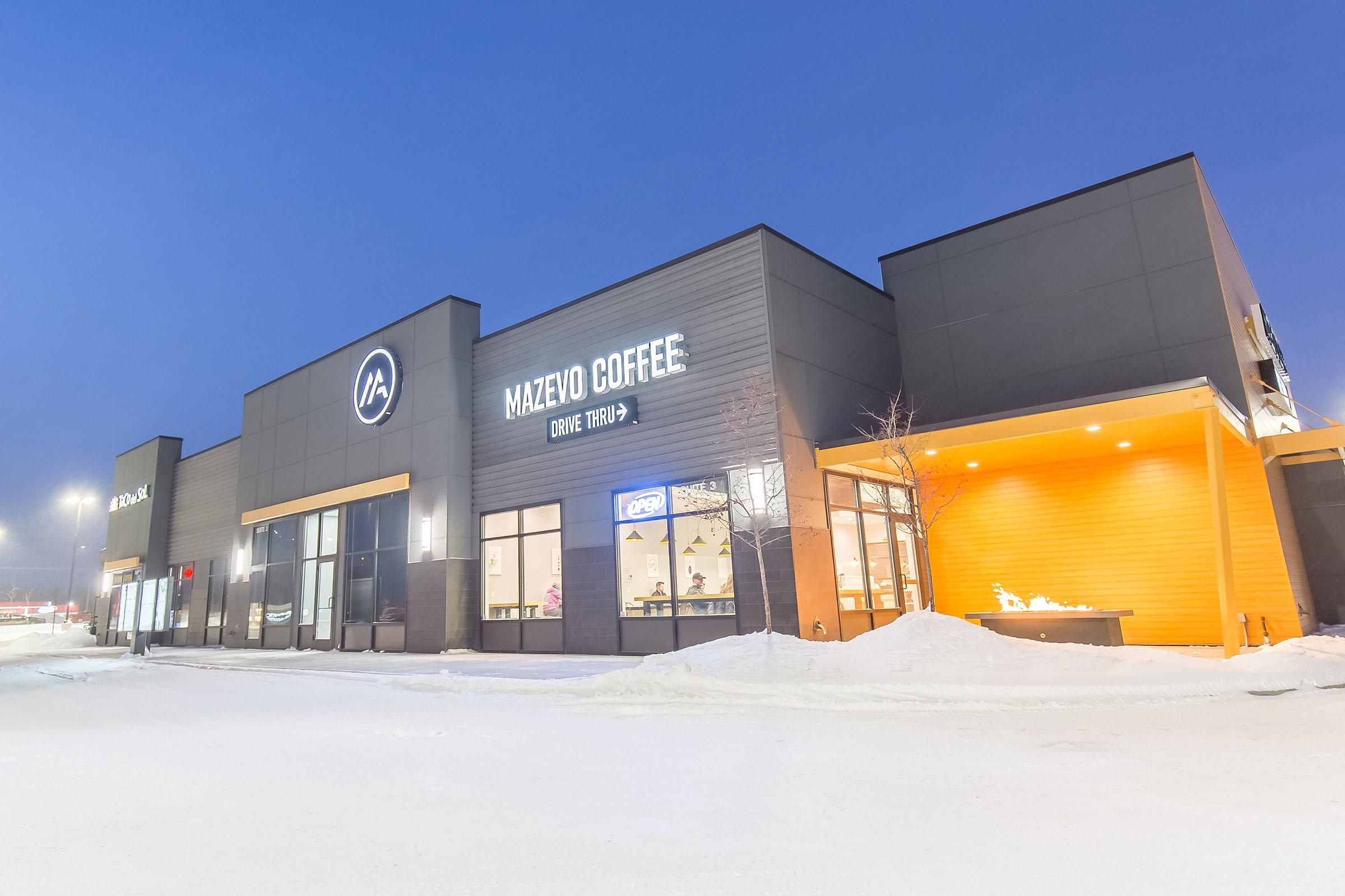 a building with snow on the ground