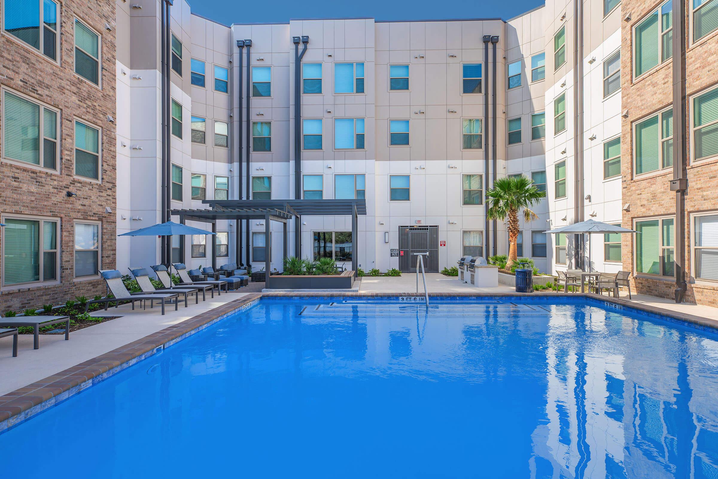 a pool next to a building