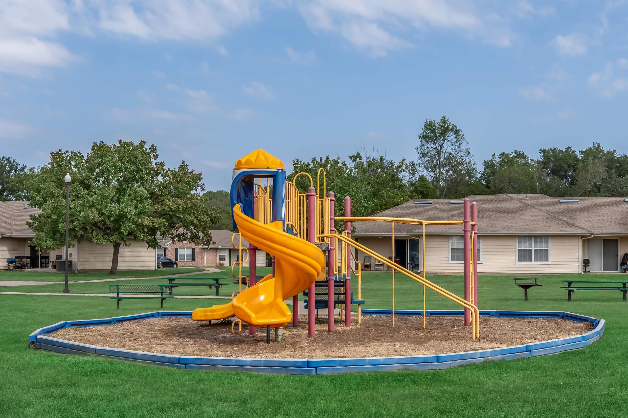 a blue frisbee sitting on top of a playground