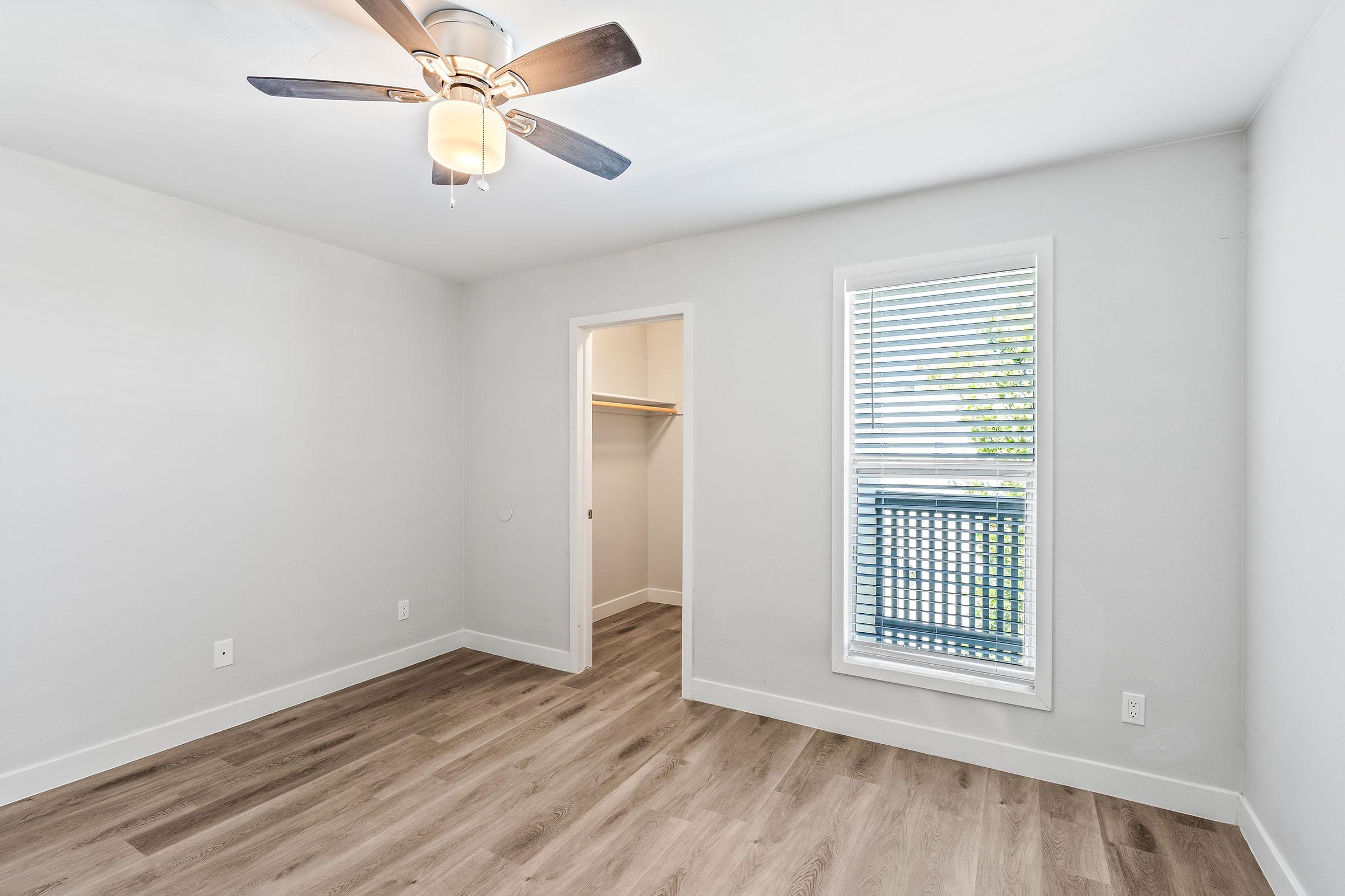 a room with a sink and a window