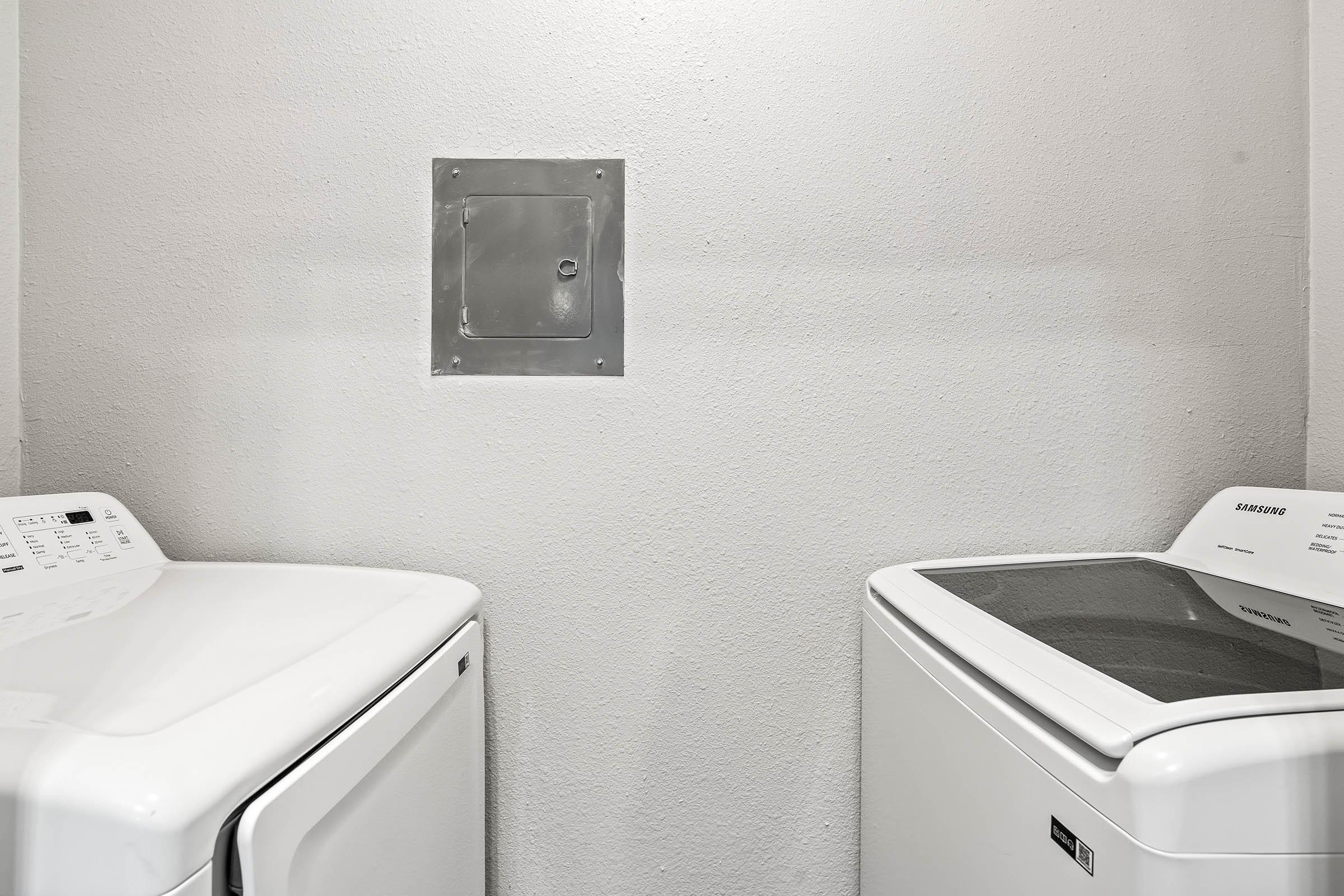 a refrigerator freezer sitting next to a sink