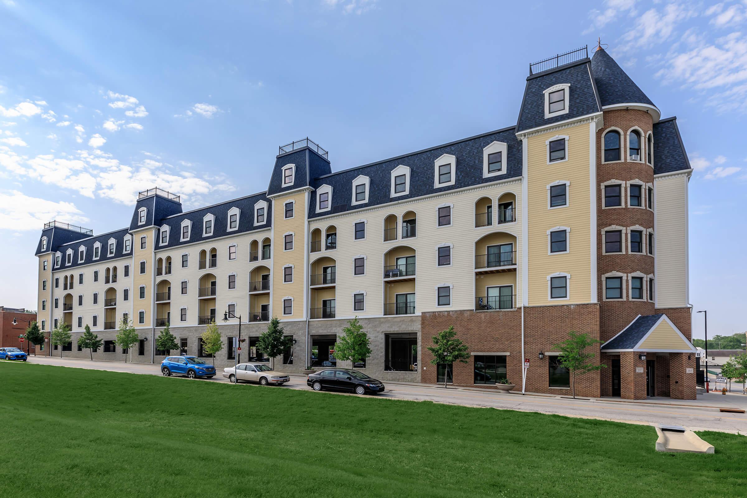 a large lawn in front of a building