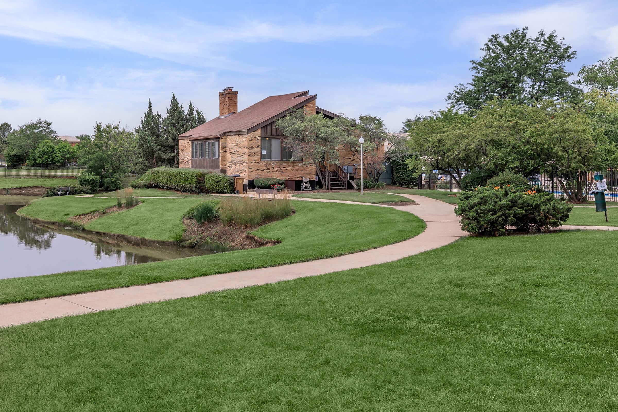 a large lawn in front of a house