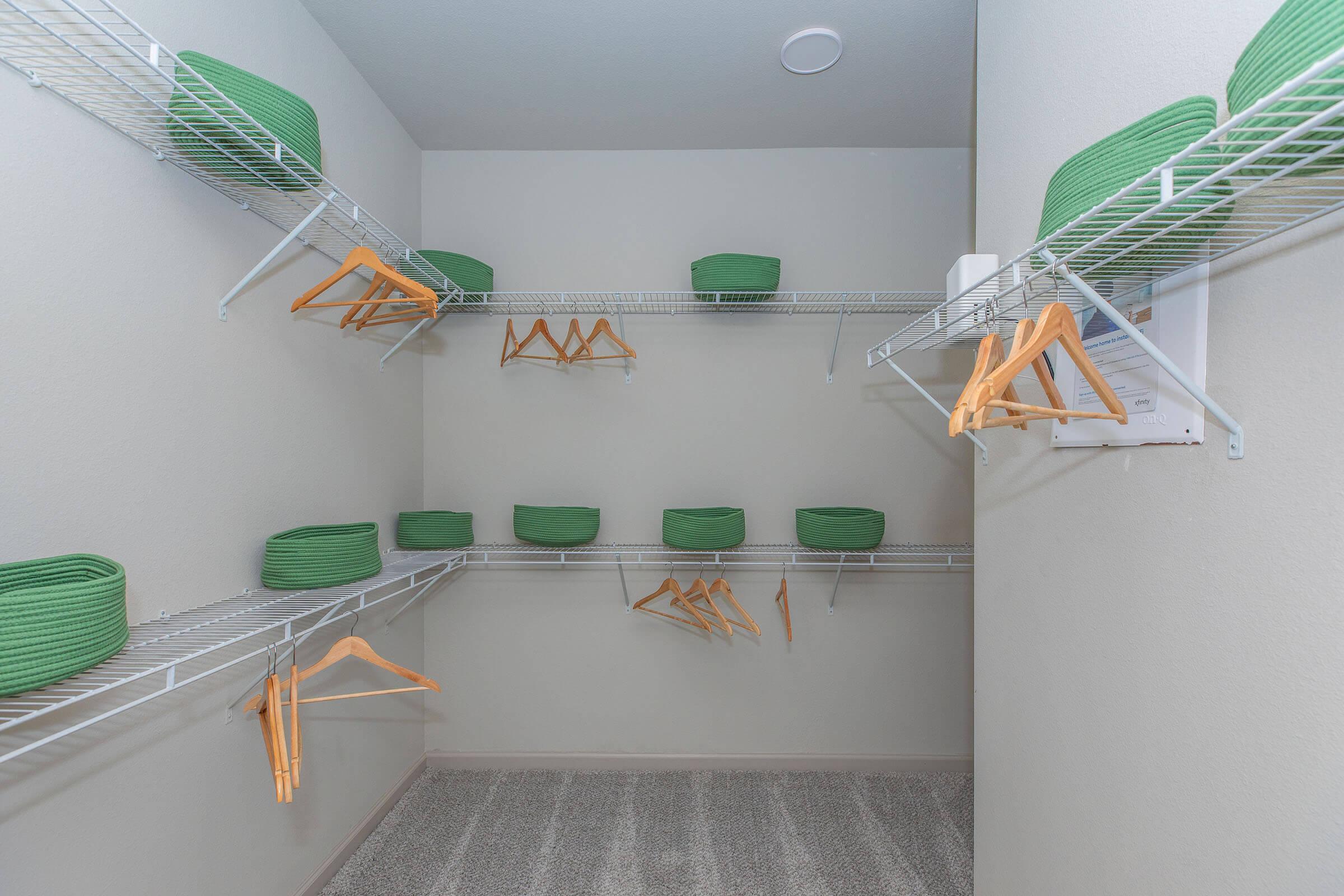 a kitchen with green walls