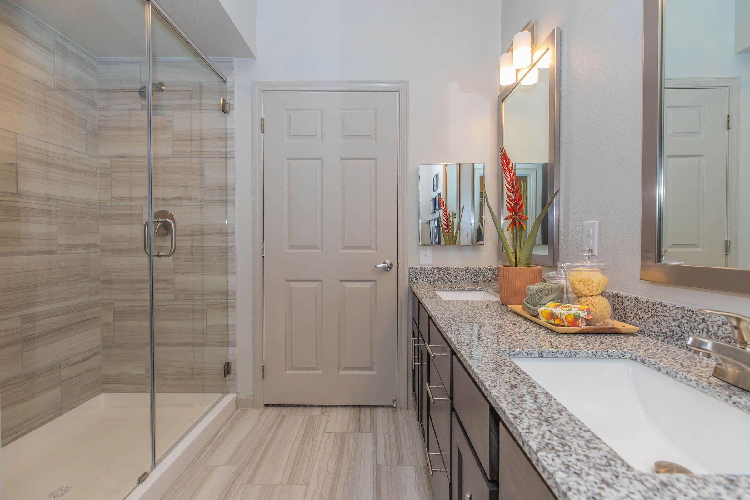 a kitchen with a glass door