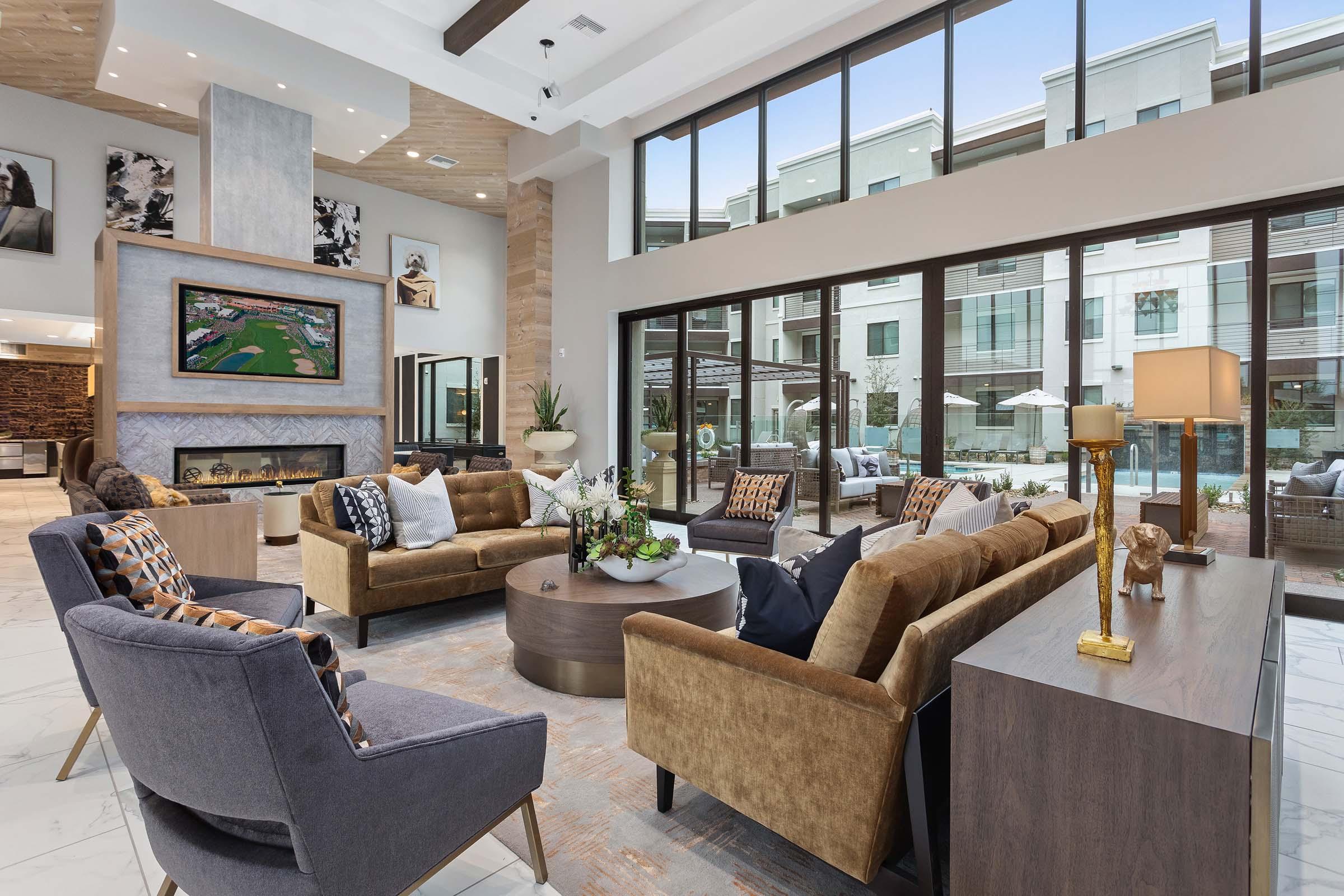 a living room filled with furniture and a fire place