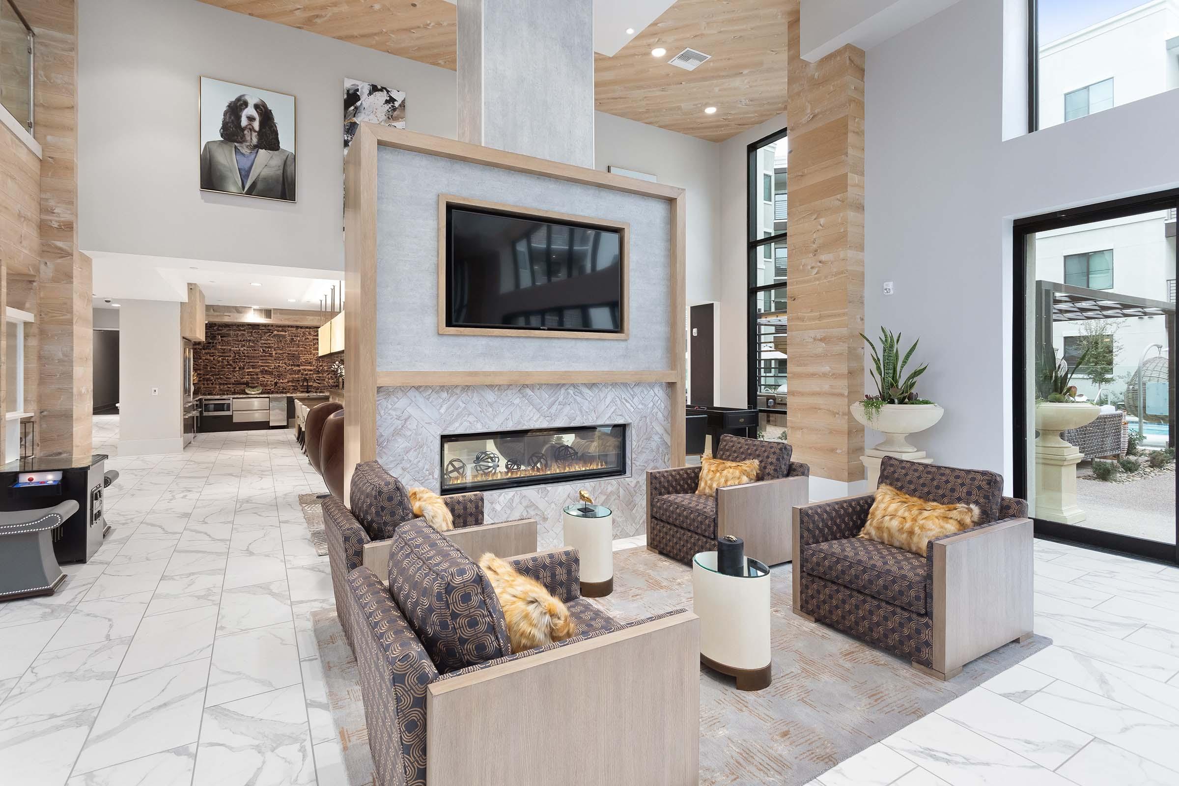 a living room filled with furniture and a fire place