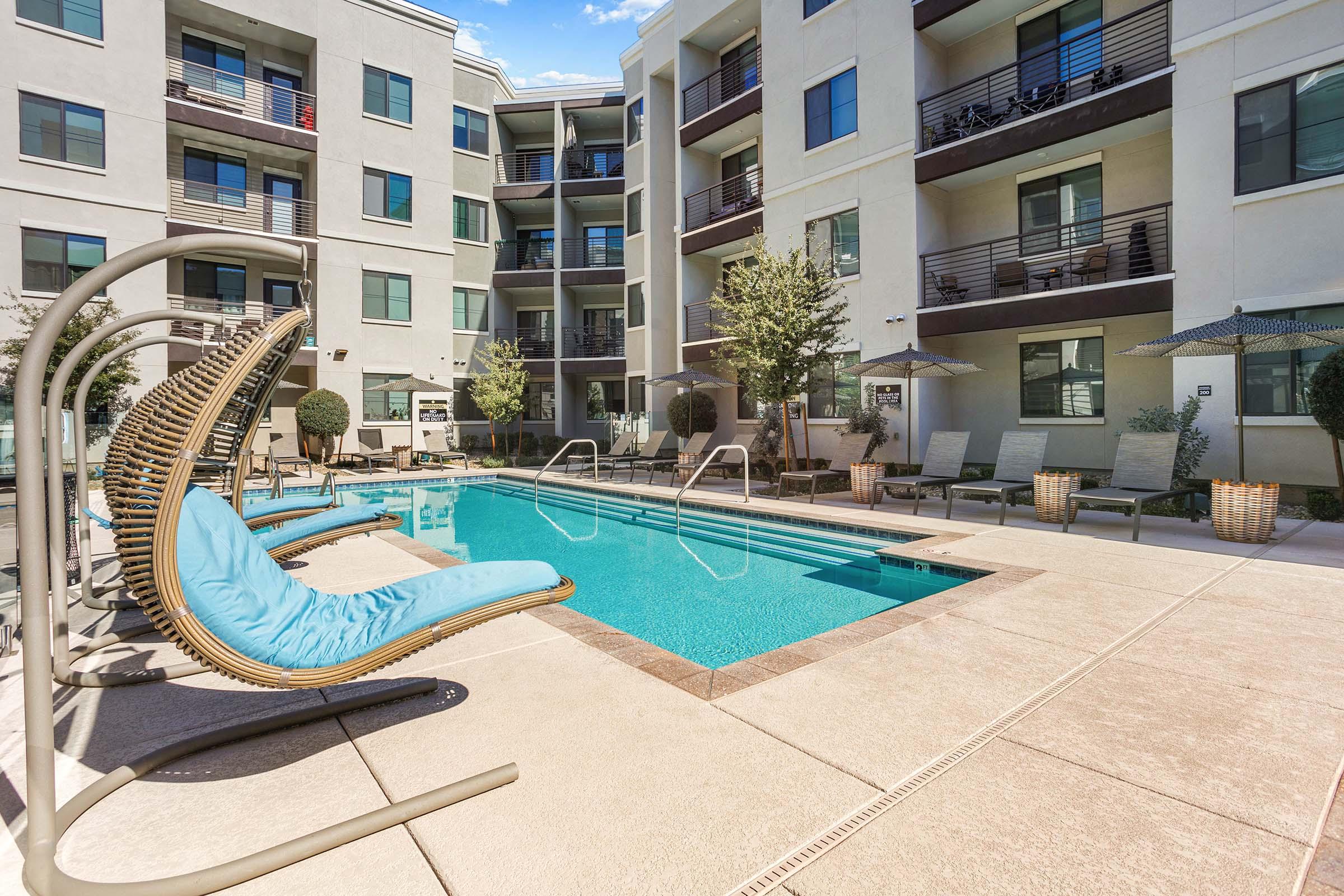 a pool in front of a building