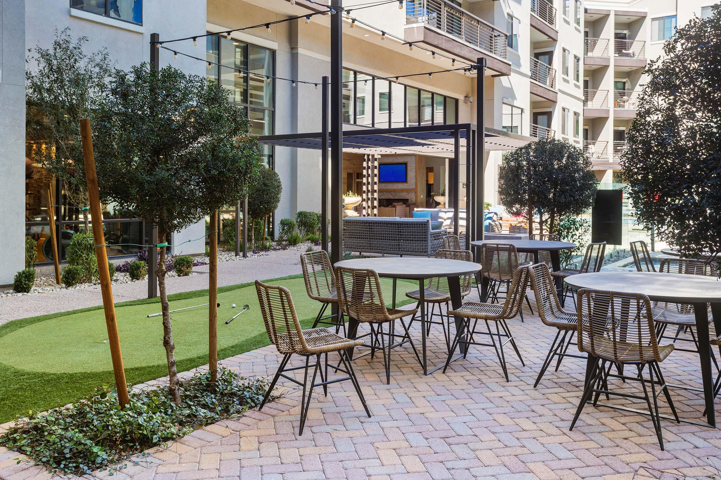 a group of lawn chairs sitting on top of a table