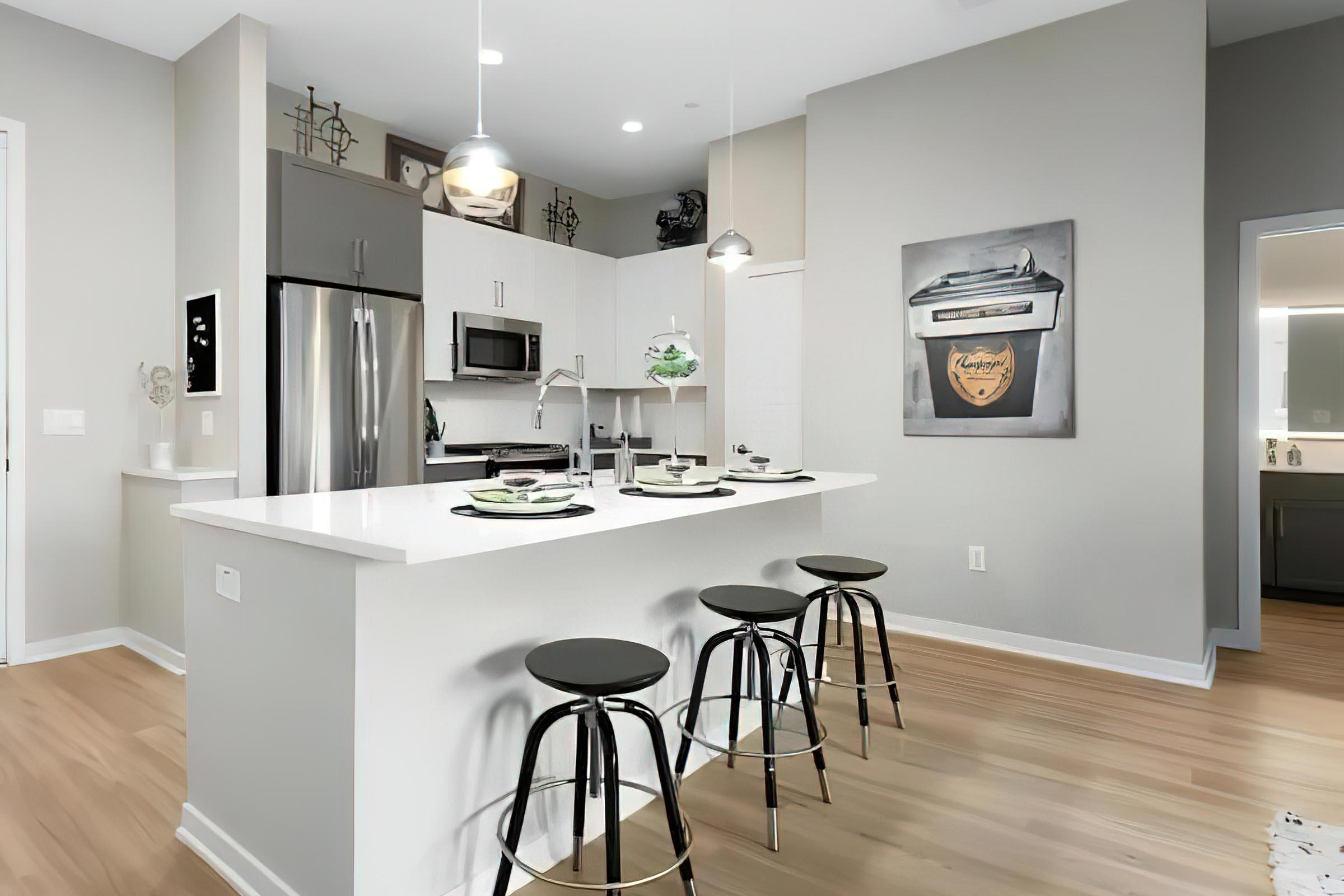 a kitchen with a wood floor