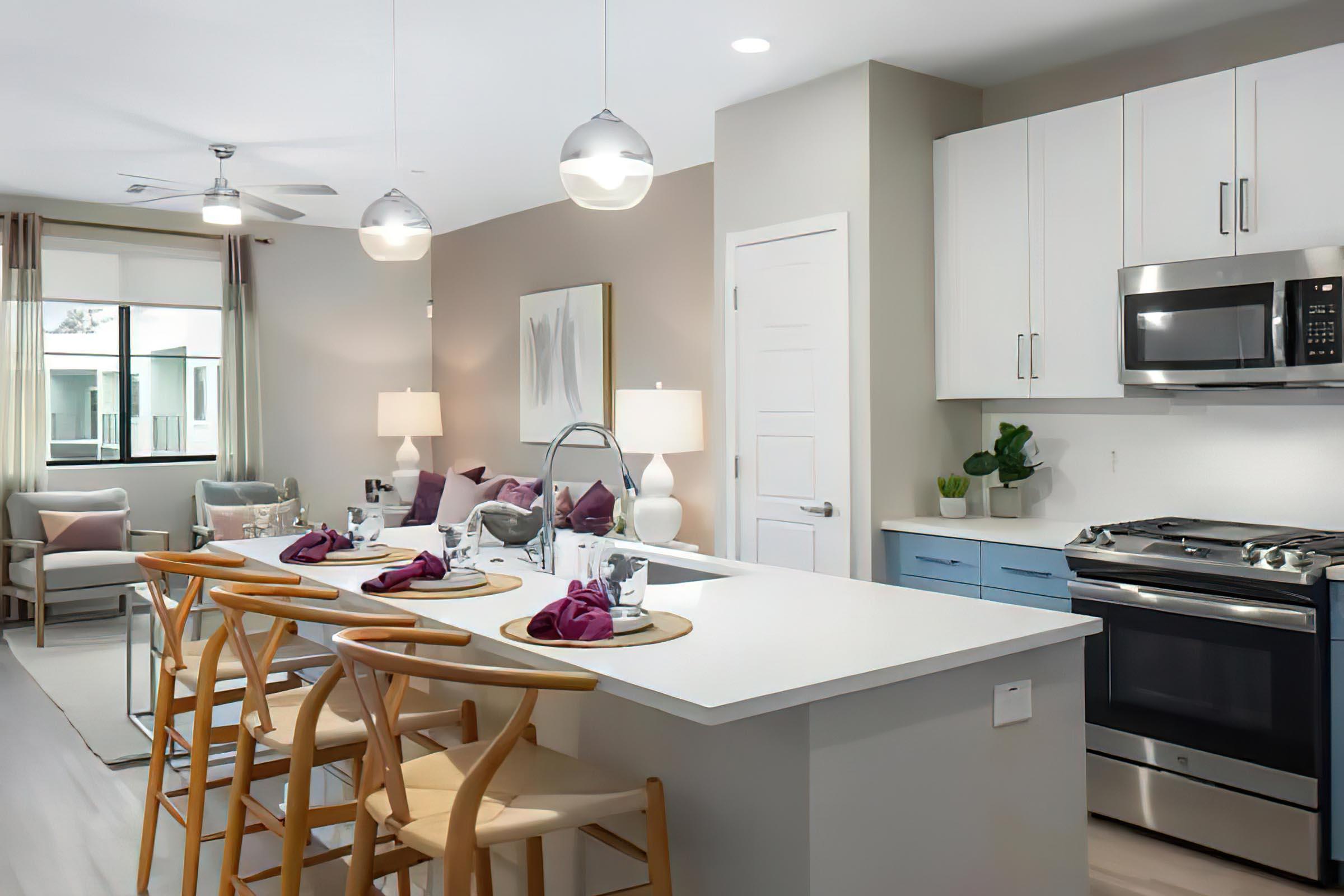 a stove top oven sitting inside of a kitchen