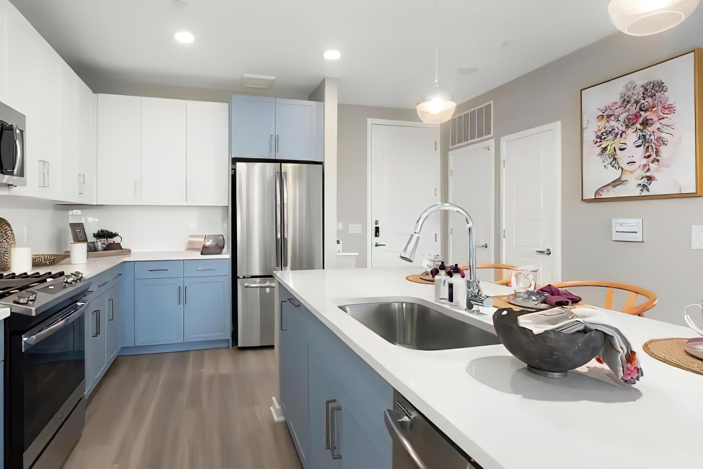 a kitchen with a sink and a counter