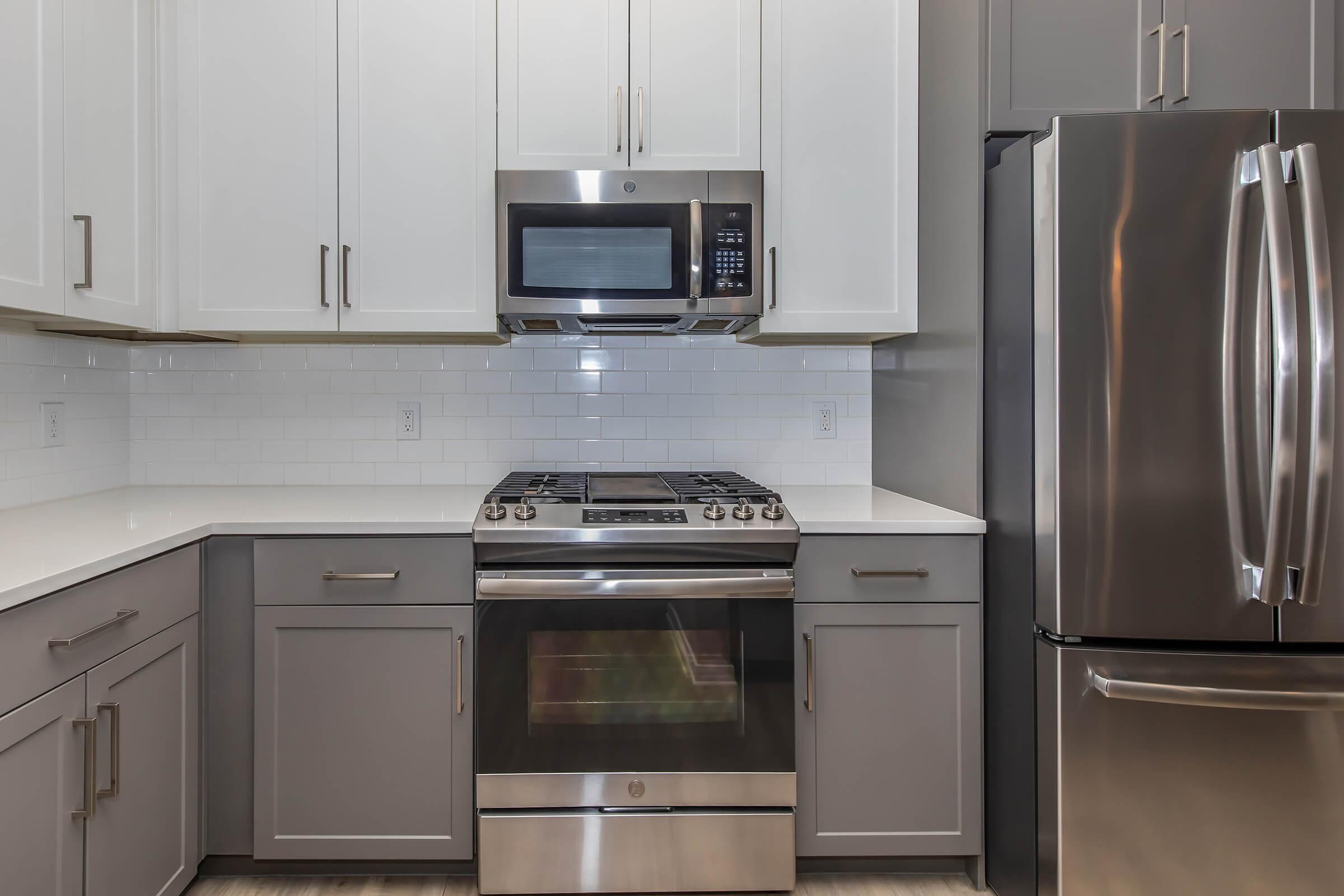 a stainless steel refrigerator in a kitchen