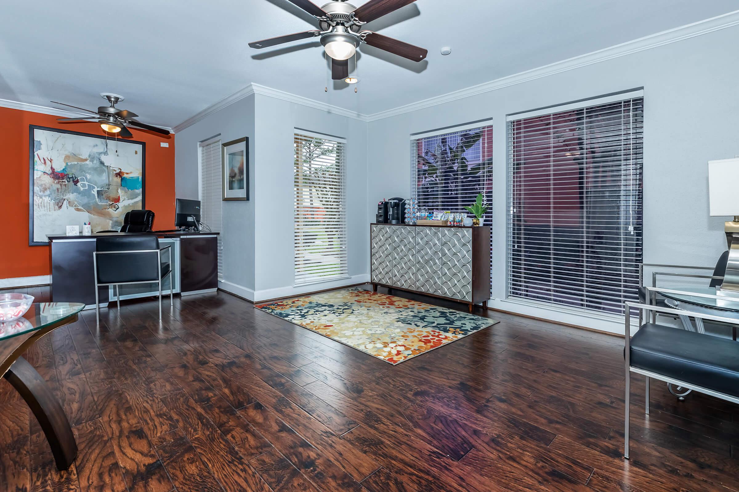 a living room filled with furniture and a fireplace