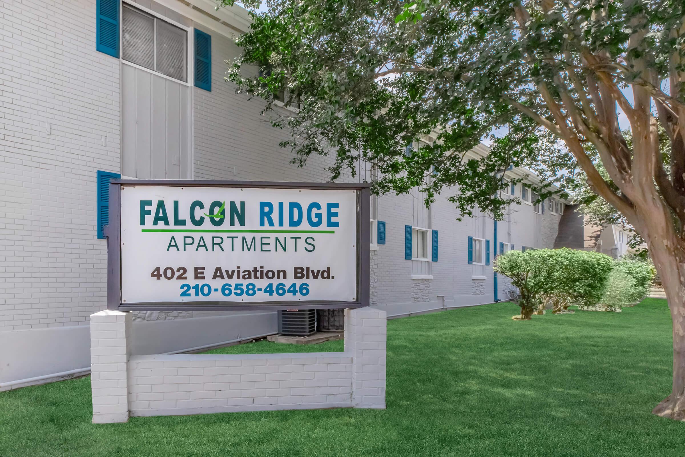 a sign in front of a building