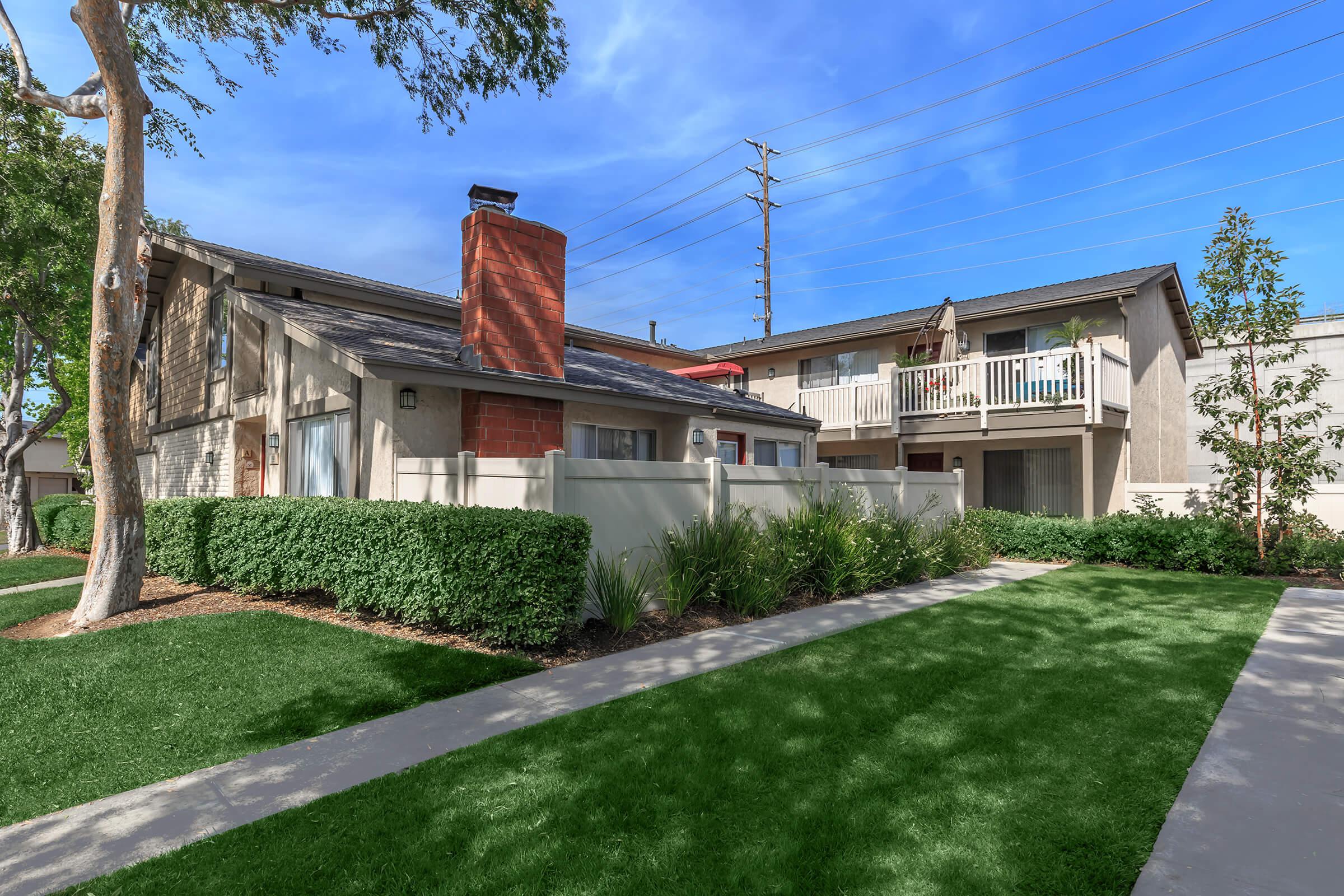 Ridgewood Village Apartment Homes community building with fenced in patio