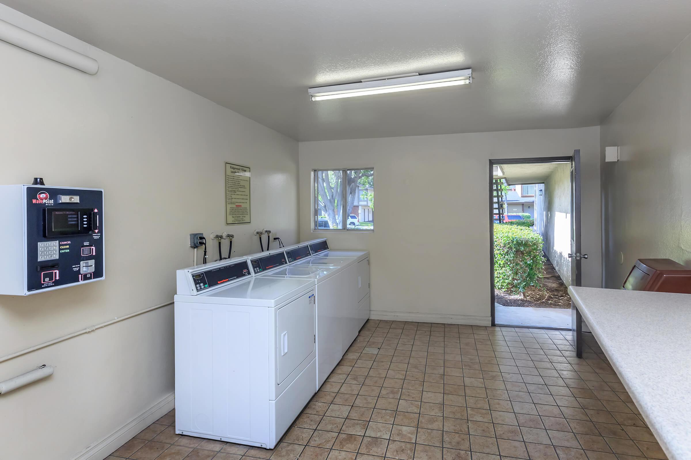 Washers and dryers in community laundry room