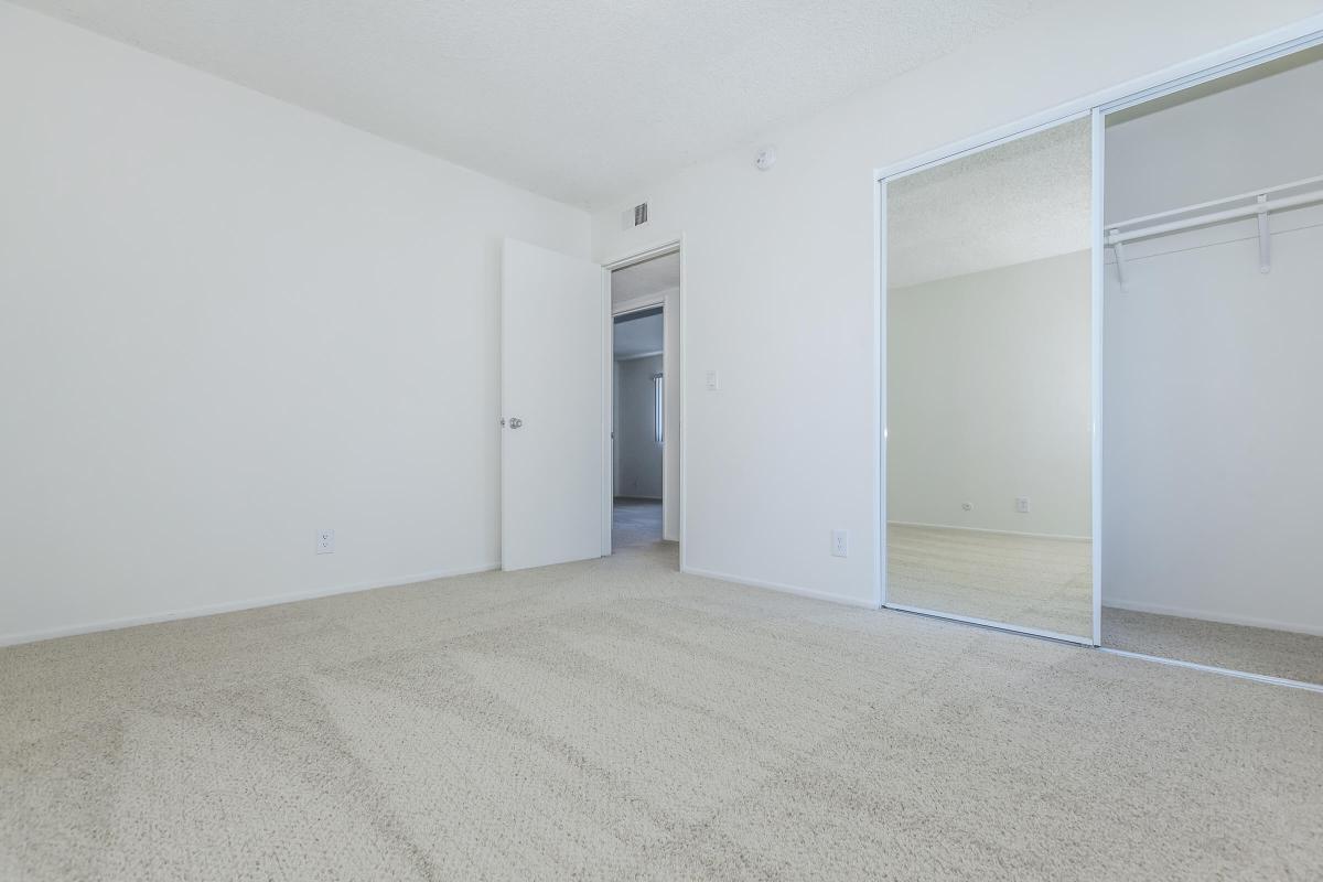 Unfurnished bedroom with carpet