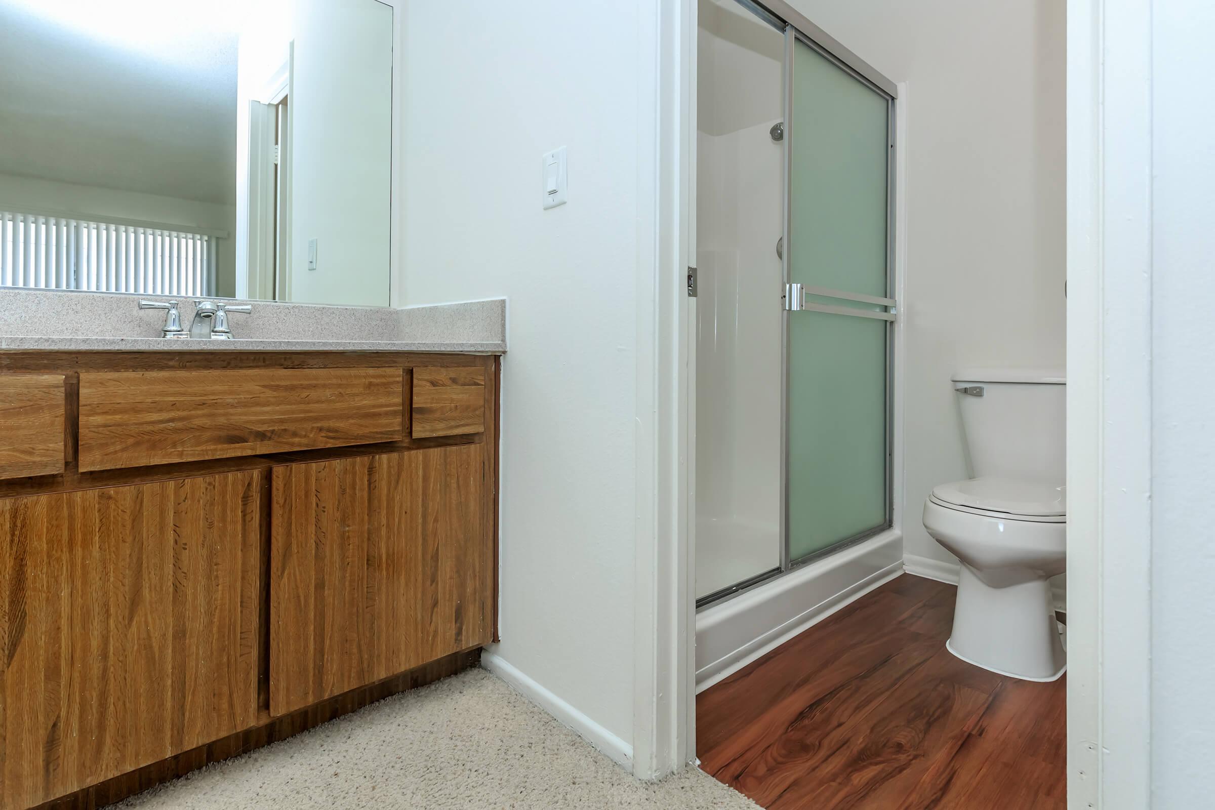 Unfurnished bathroom with wooden floors