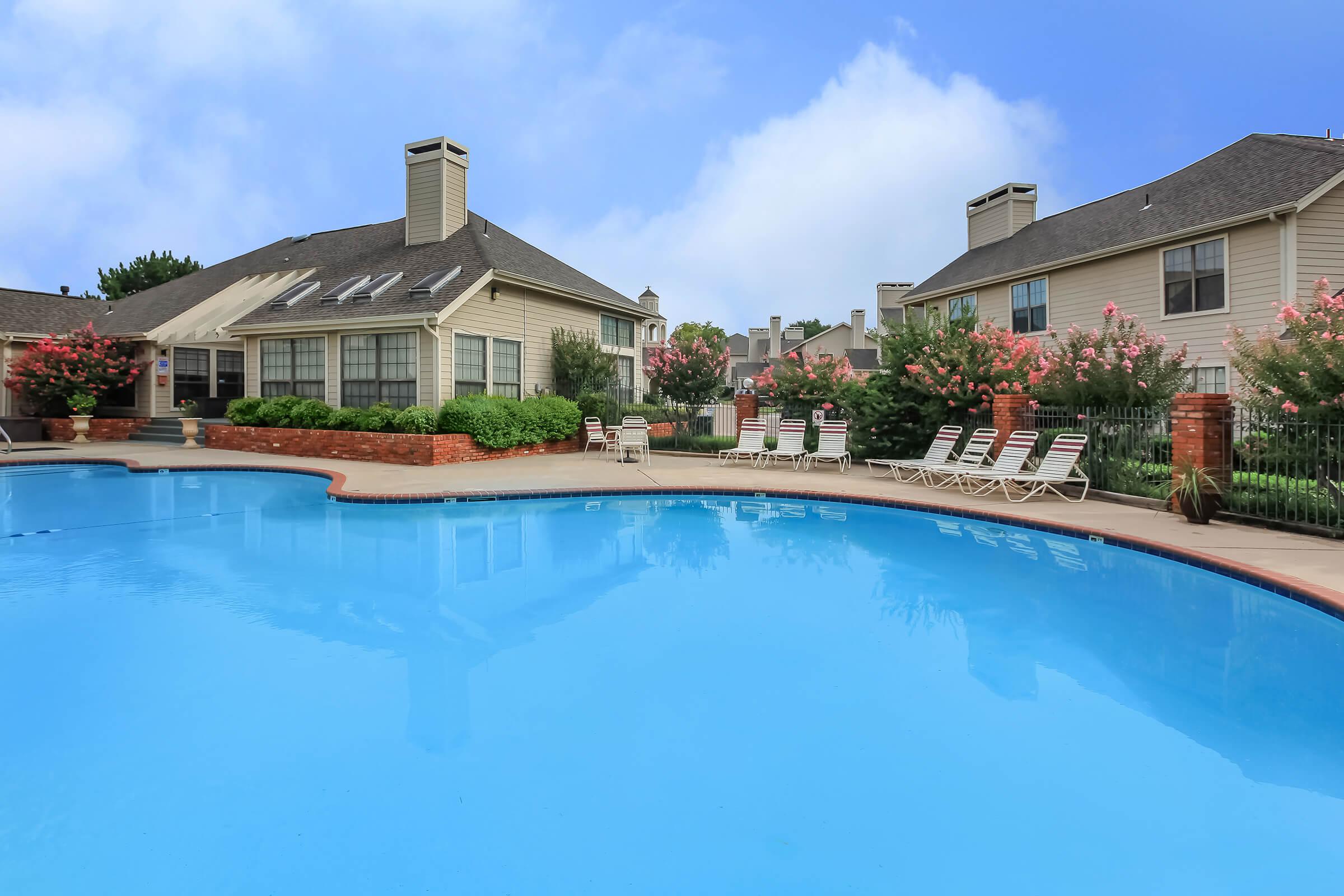 a house with a large pool of water