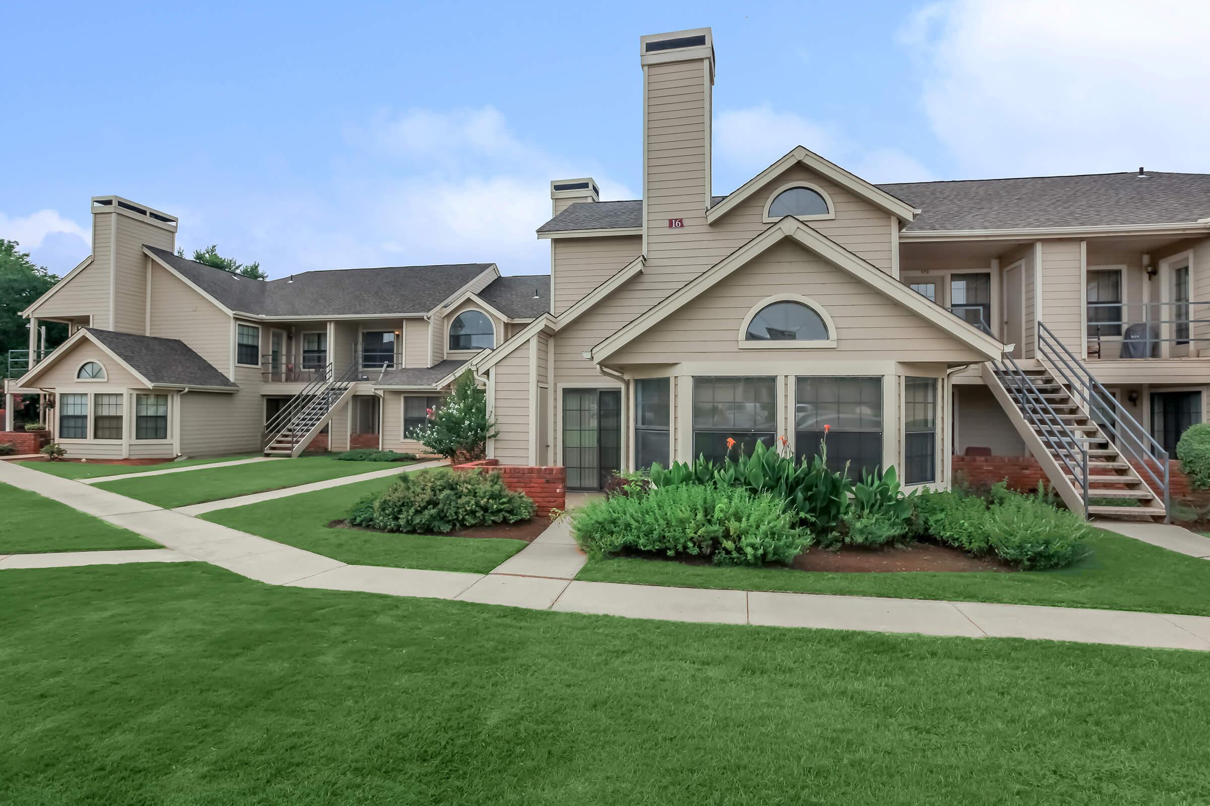 a large lawn in front of a house