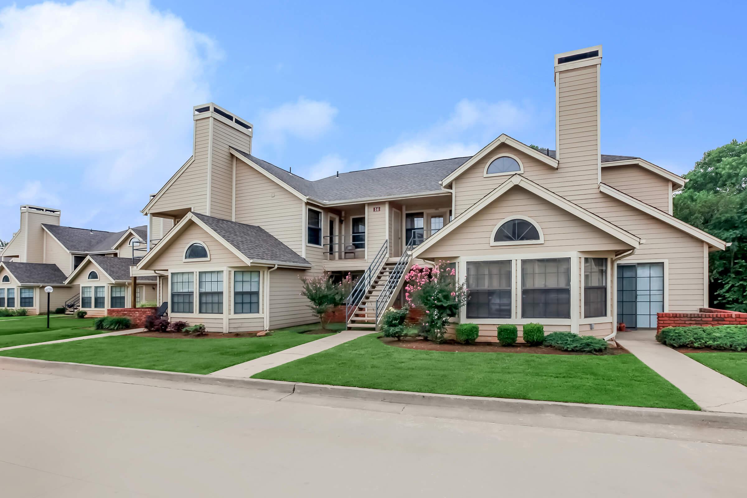 a large lawn in front of a house