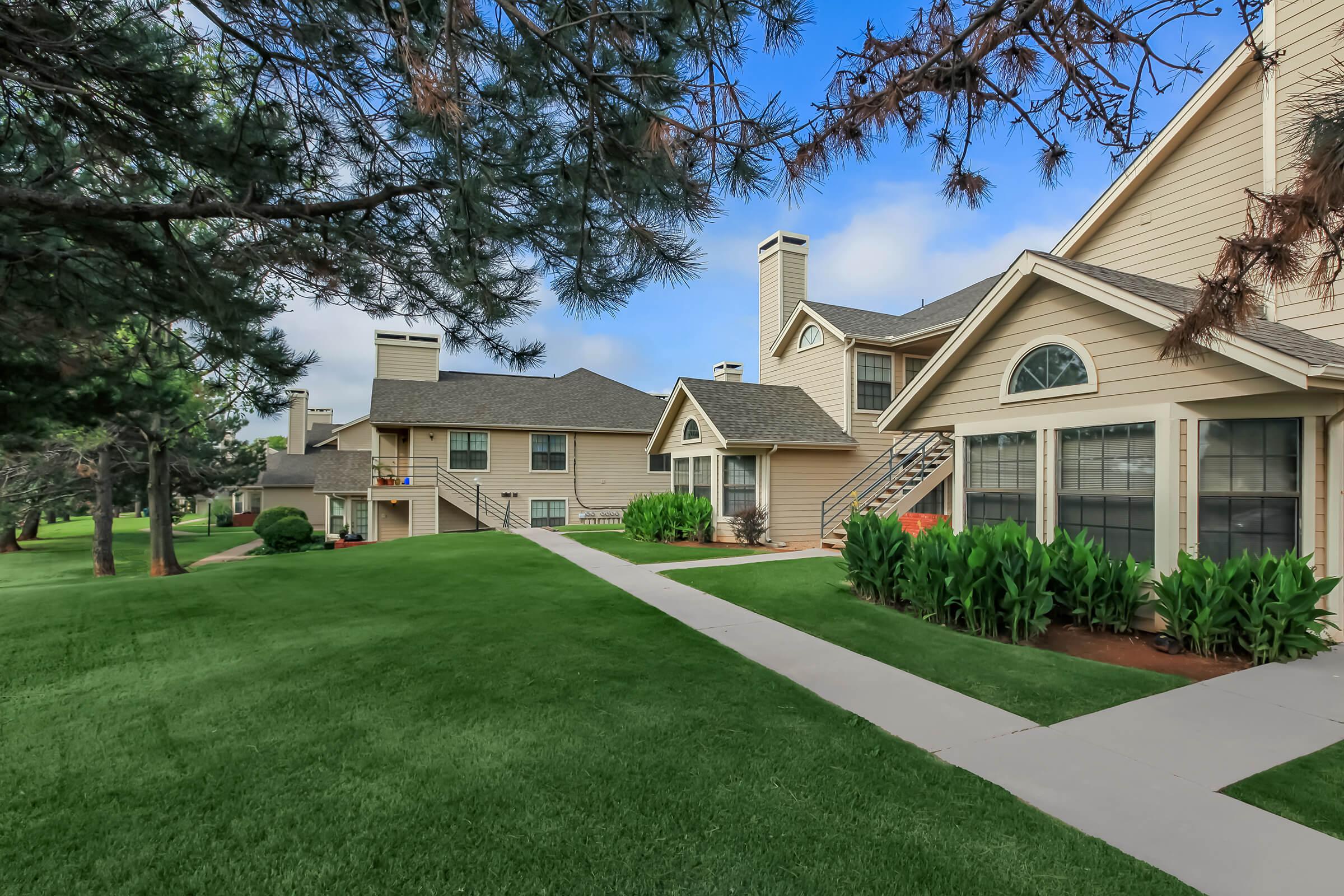 a large lawn in front of a house