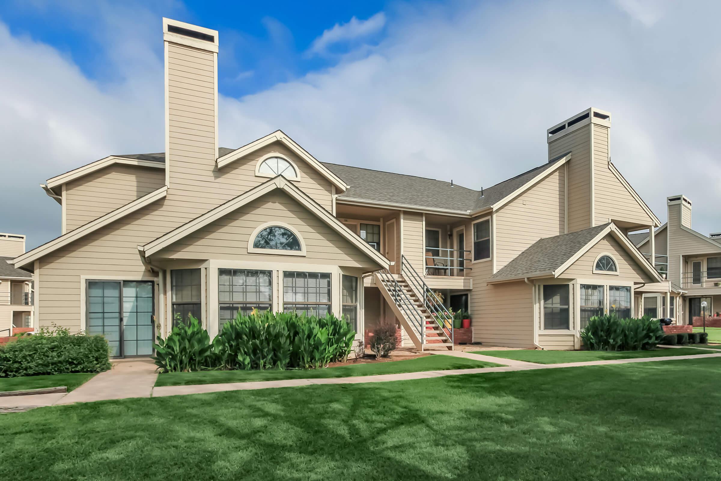 a large lawn in front of a house