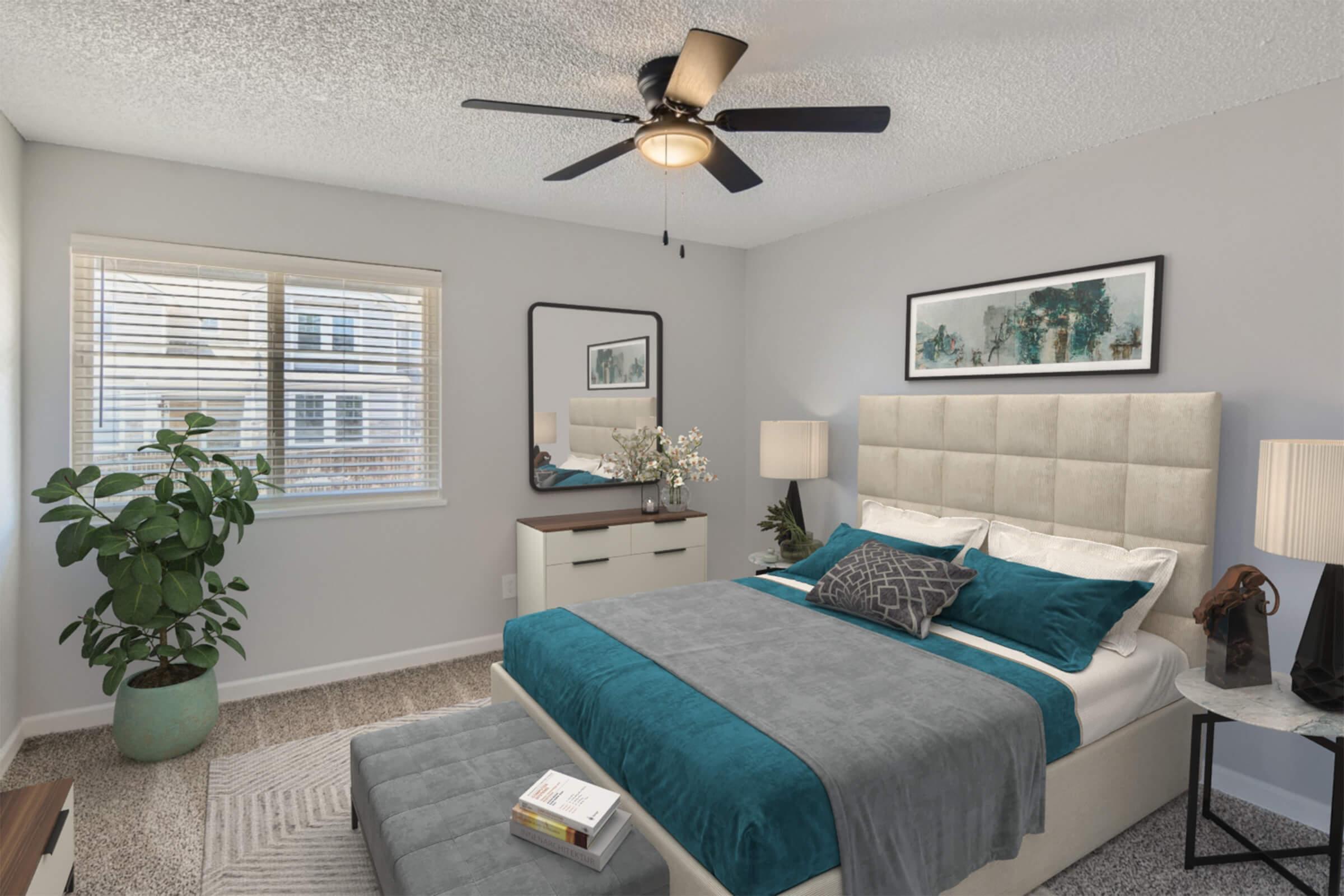 a living room with a bed and a window