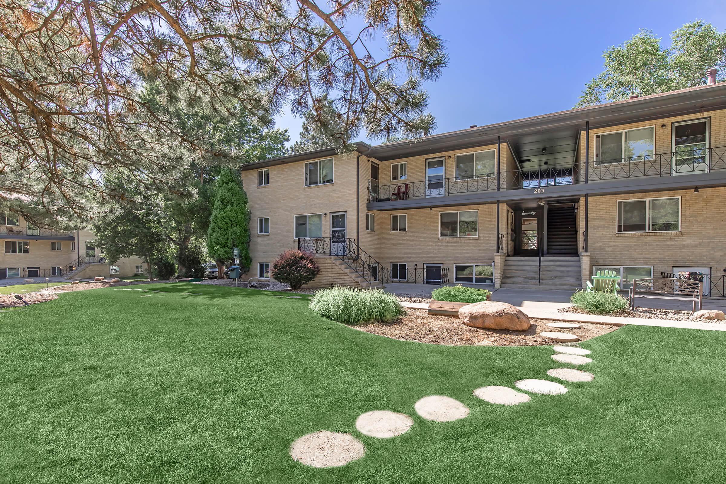 a large lawn in front of a house