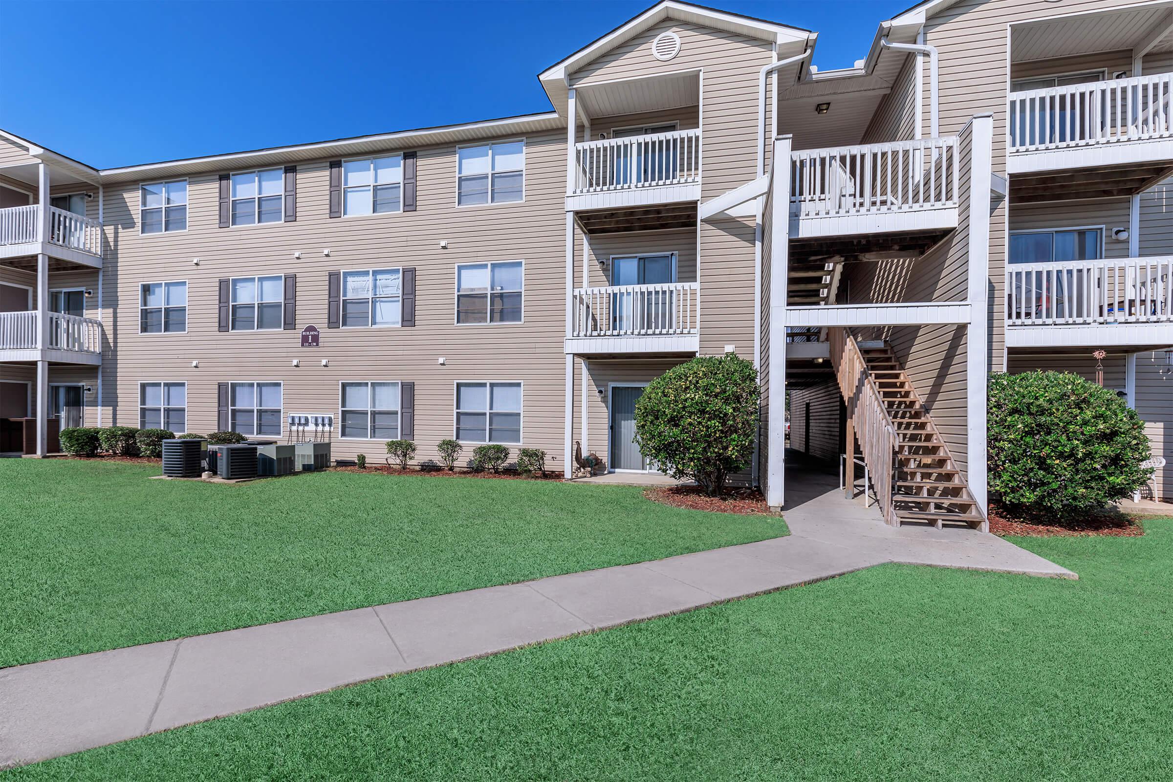 a large lawn in front of a building