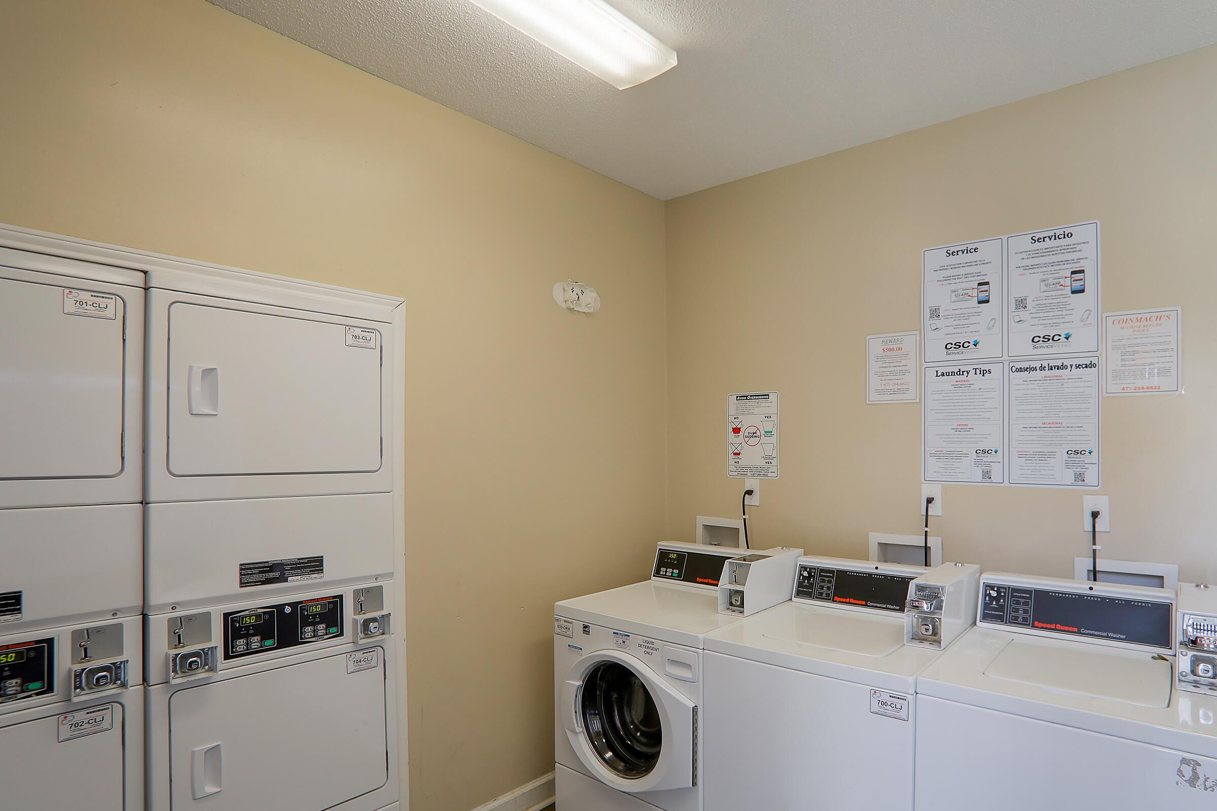 a white refrigerator freezer sitting in a room