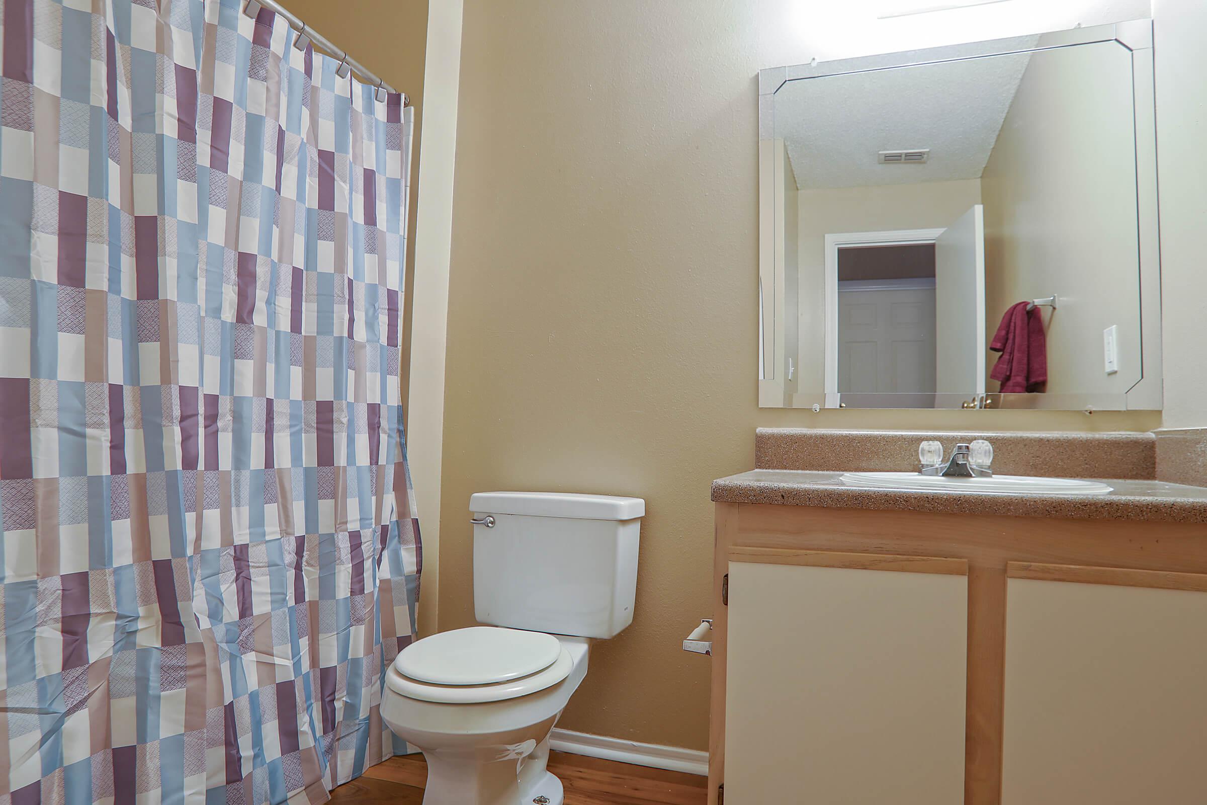 a white tub sitting next to a window