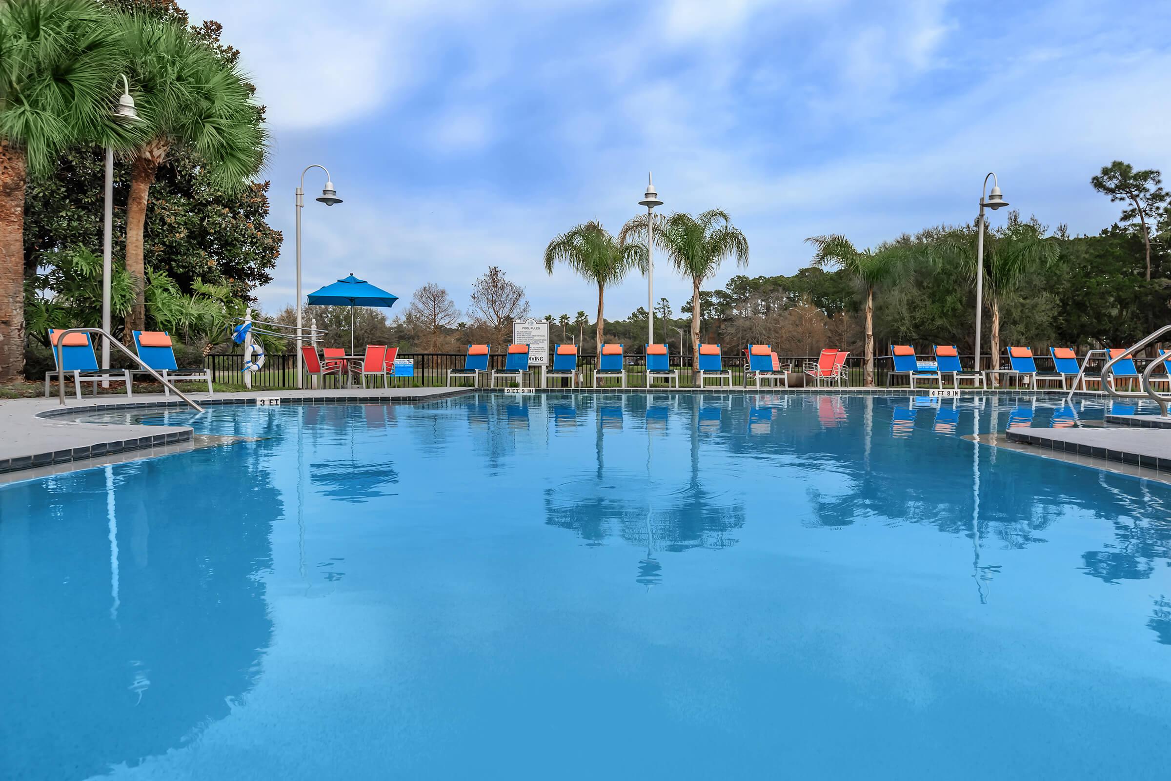 a pool next to a body of water