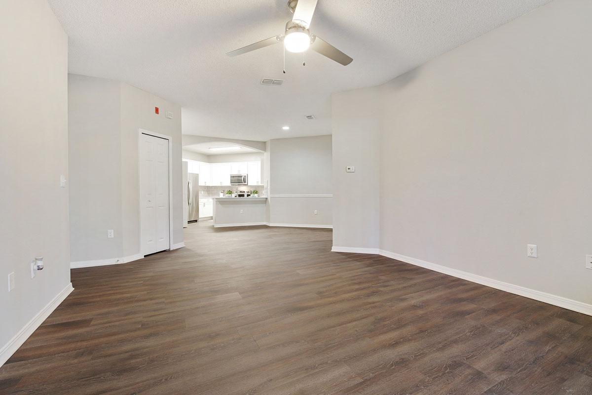 a kitchen with a wood floor