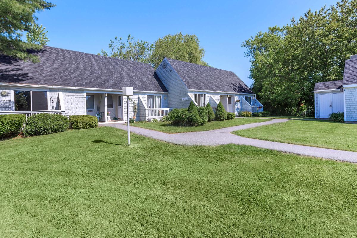 a large lawn in front of a house