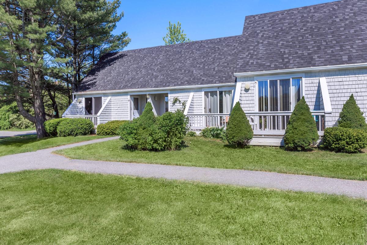 a large lawn in front of a house