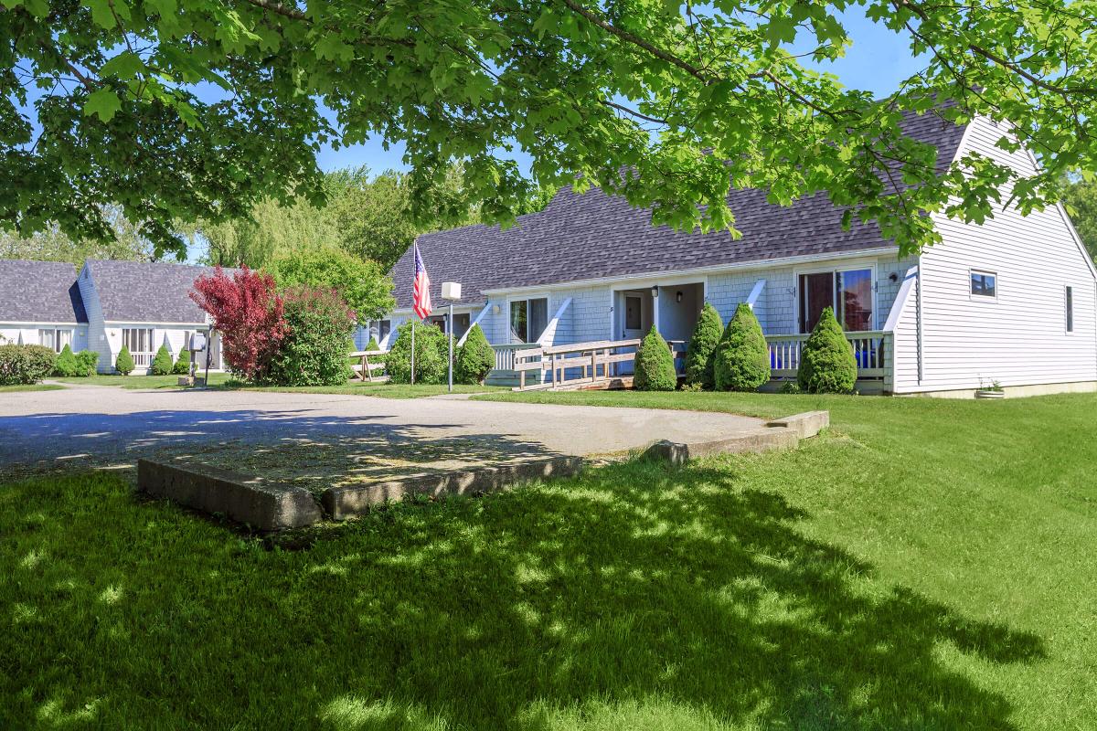 a large lawn in front of a house