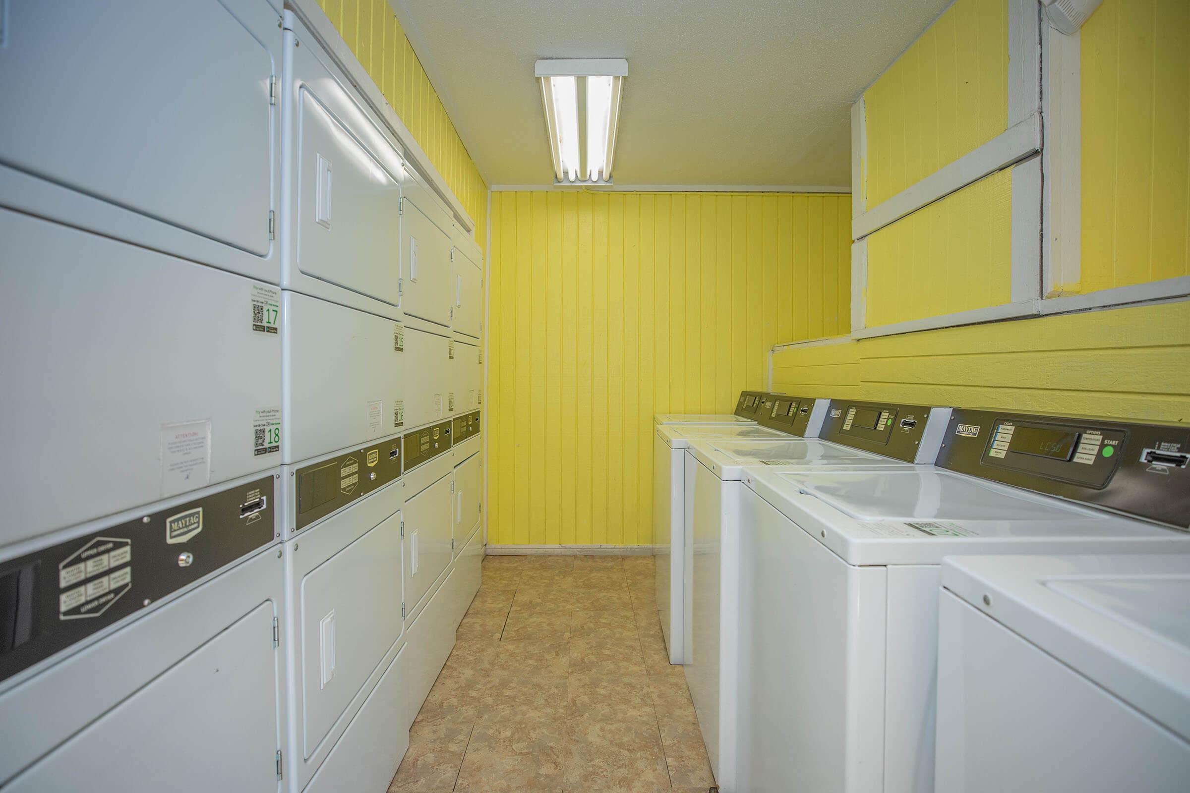 a stove top oven sitting inside of a kitchen