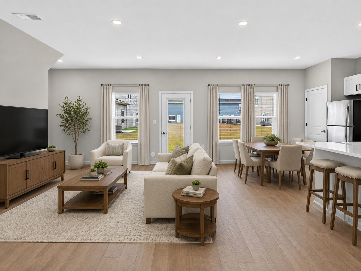 Experience modern living in a bright and airy open-concept space, where natural light flows through large windows and stylish design creates the perfect atmosphere for relaxation and entertaining.