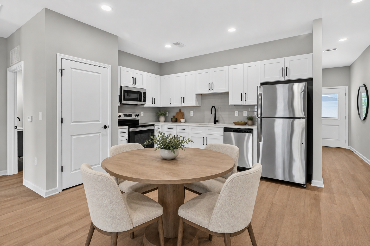 Step into modern living with this bright, spacious kitchen, perfect for entertaining or enjoying a quiet meal, featuring stylish finishes and an inviting atmosphere.